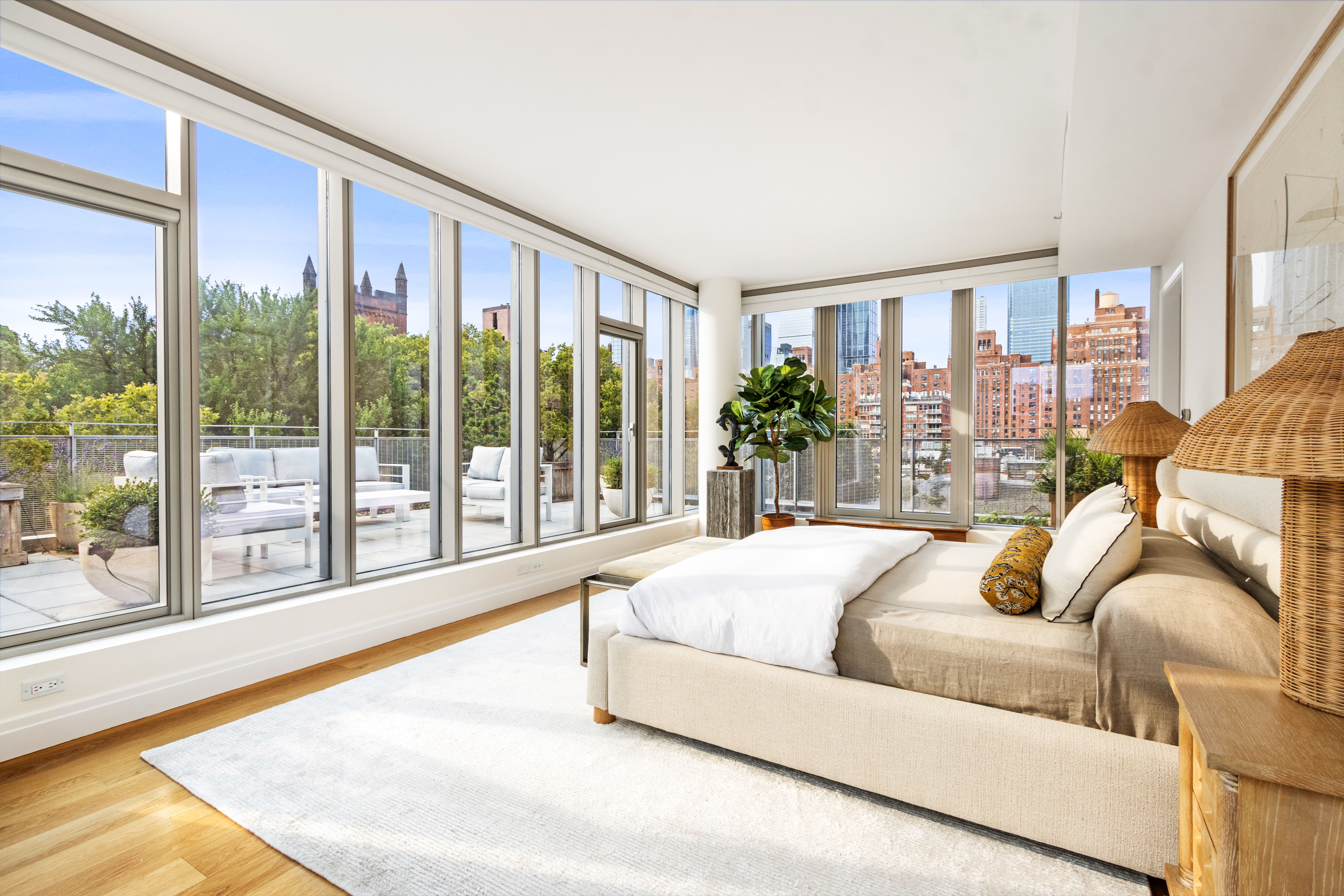 177 9th Avenue, Unit PHA Manhattan, NY 10011 - Photo 8 of 28 a living room with couch and a large window