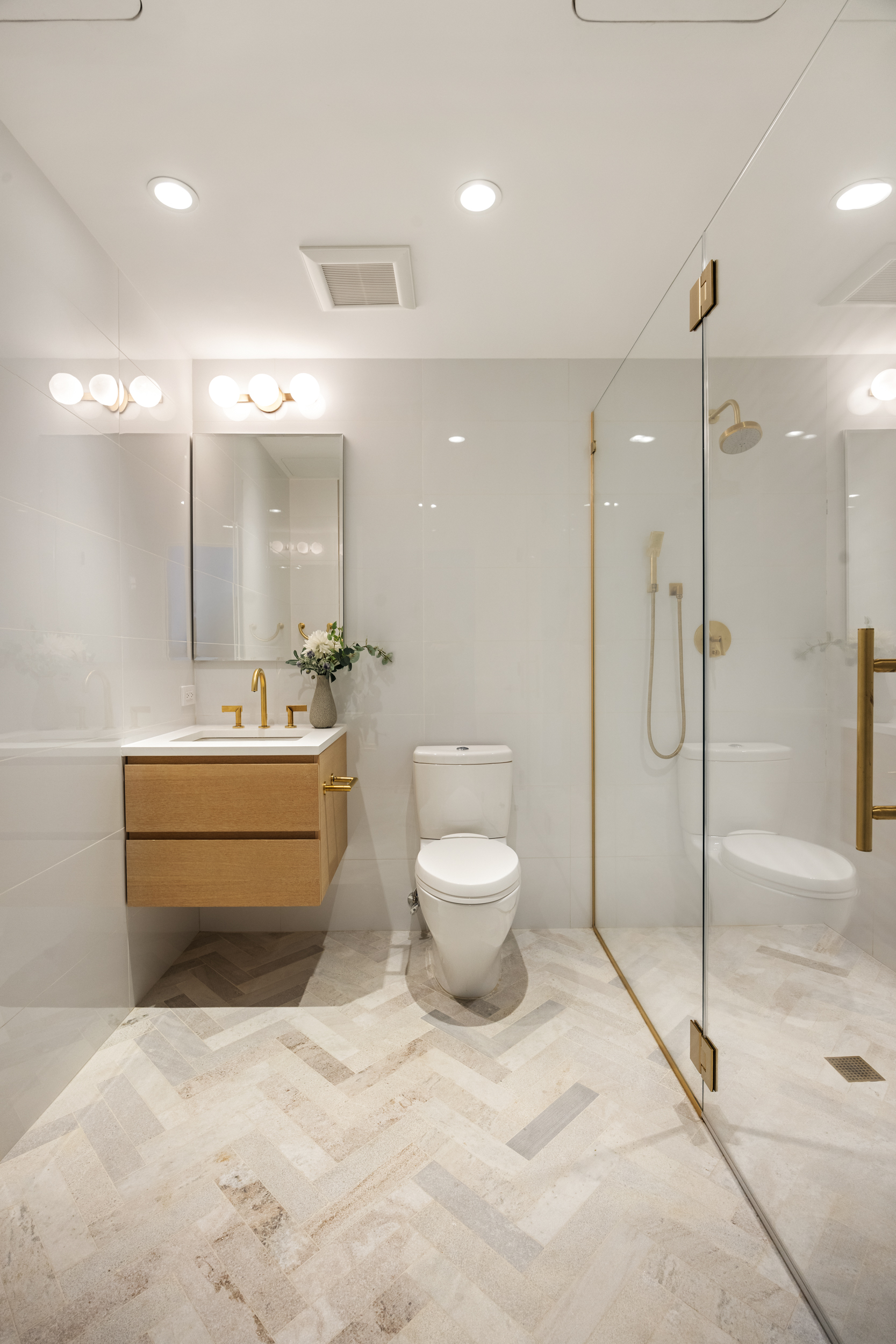 45 Warren Street, Unit PH Manhattan, NY 10007 - Photo 23 of 29 a bathroom with a toilet a sink and a mirror