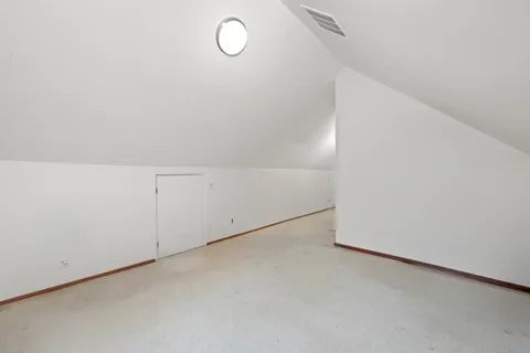 a view of a refrigerator in kitchen