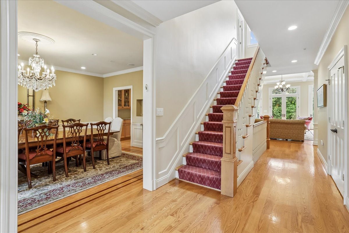 11736 Gainsborough Road Potomac, MD 20854 - Photo 18 of 90 a view of a dining room with furniture chandelier and wooden floor