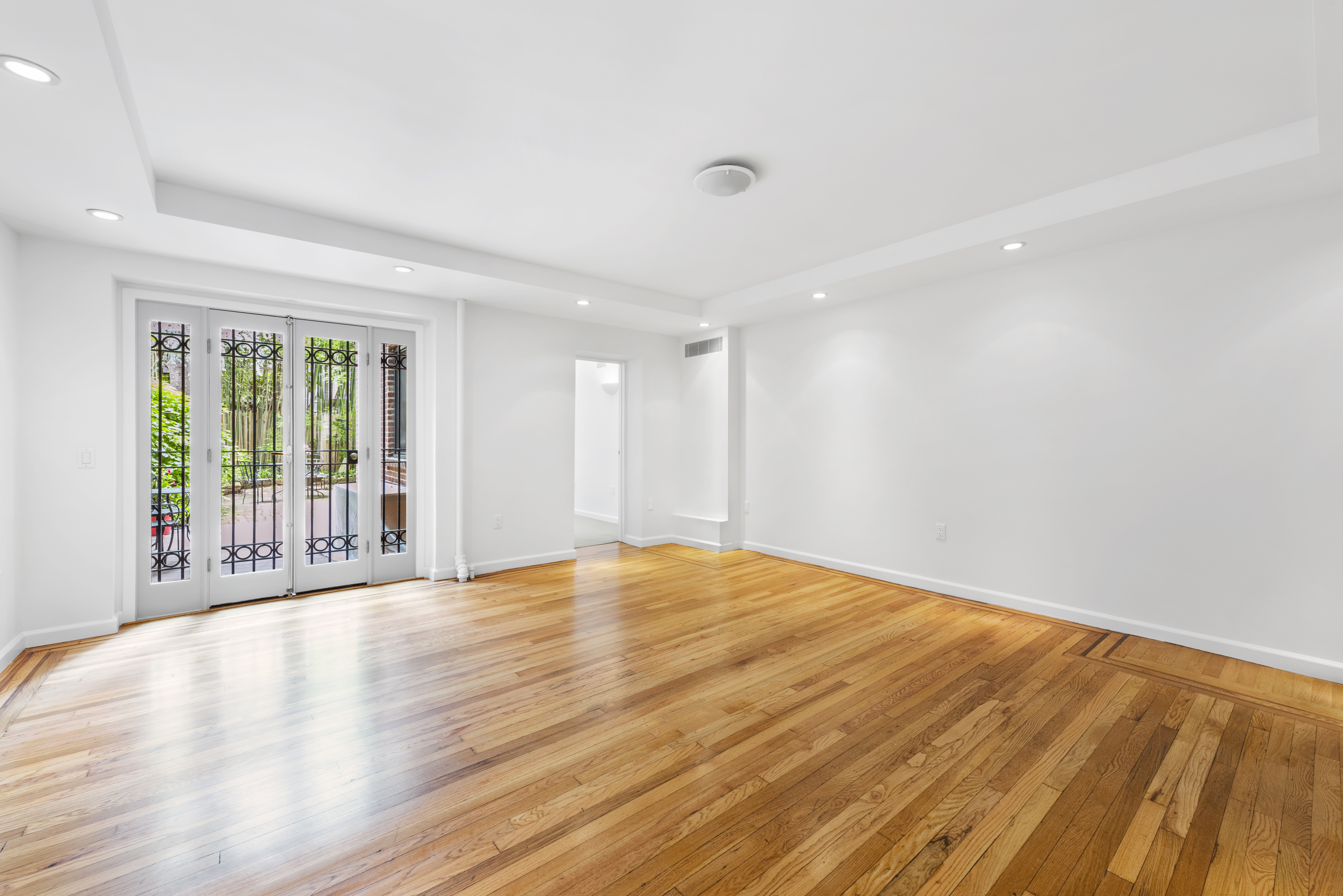 325 West 84th Street, Unit MAIS Manhattan, NY 10024 - Photo 8 of 9 a view of an empty room with wooden floor and a window