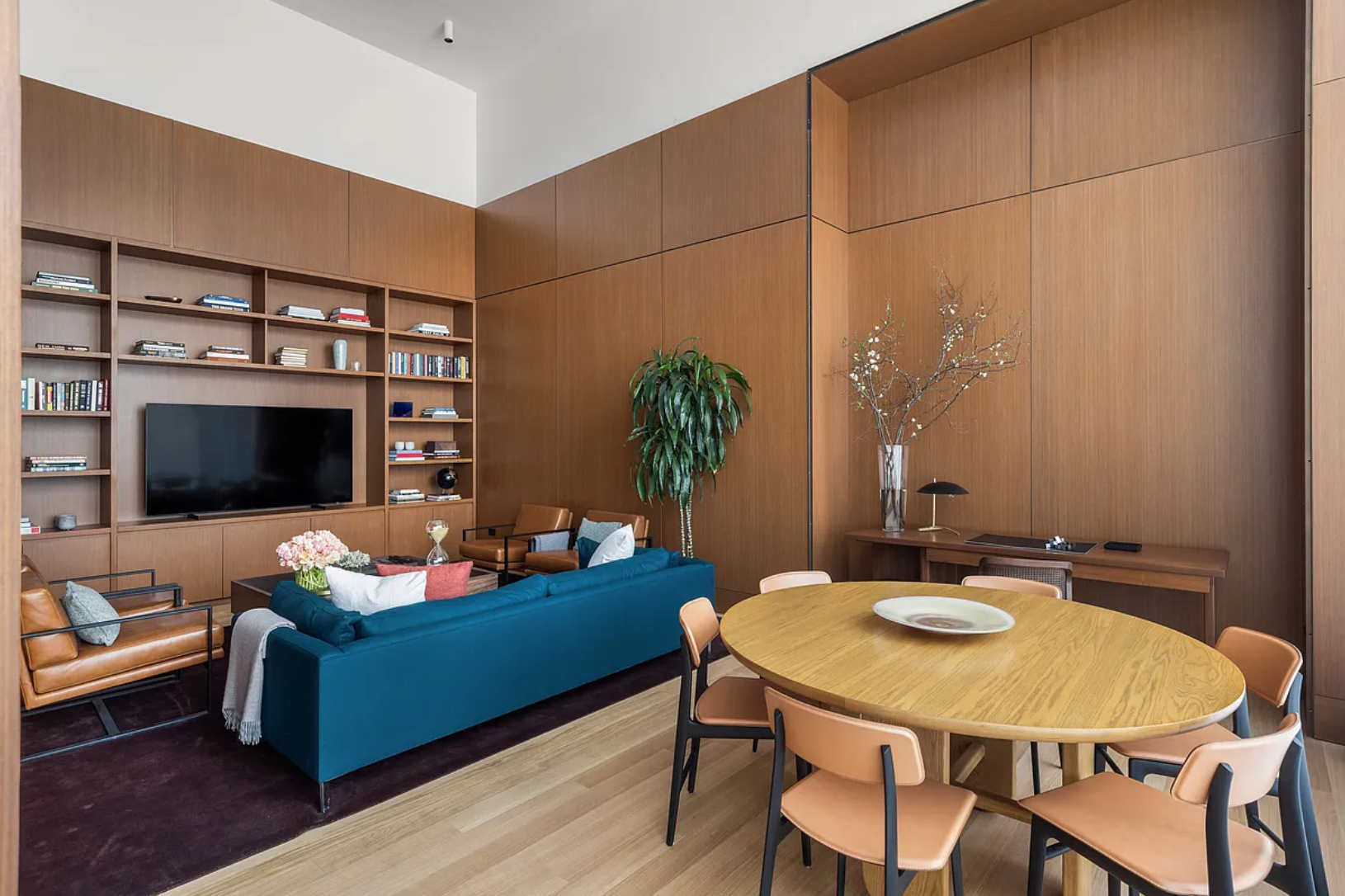 15 East 30th Street, Unit 19B Manhattan, NY 10016 - Photo 34 of 40 a living room with furniture and a flat screen tv