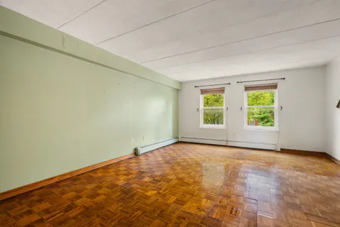 an empty room with windows