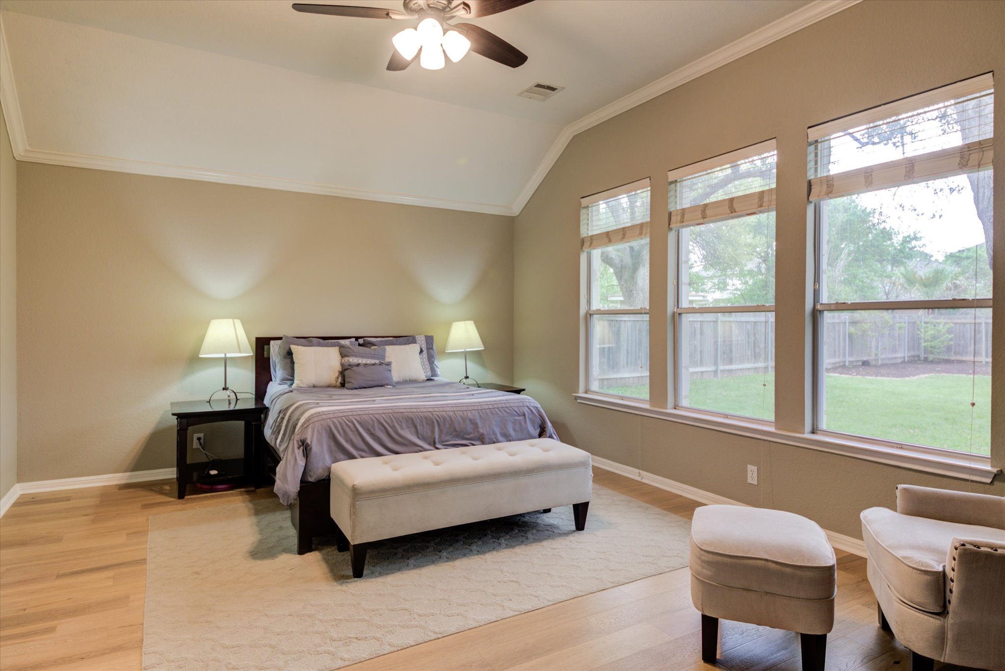 5412 Batak Lane Austin, TX 78749 - Photo 25 of 40 a spacious bedroom with a bed and a large window