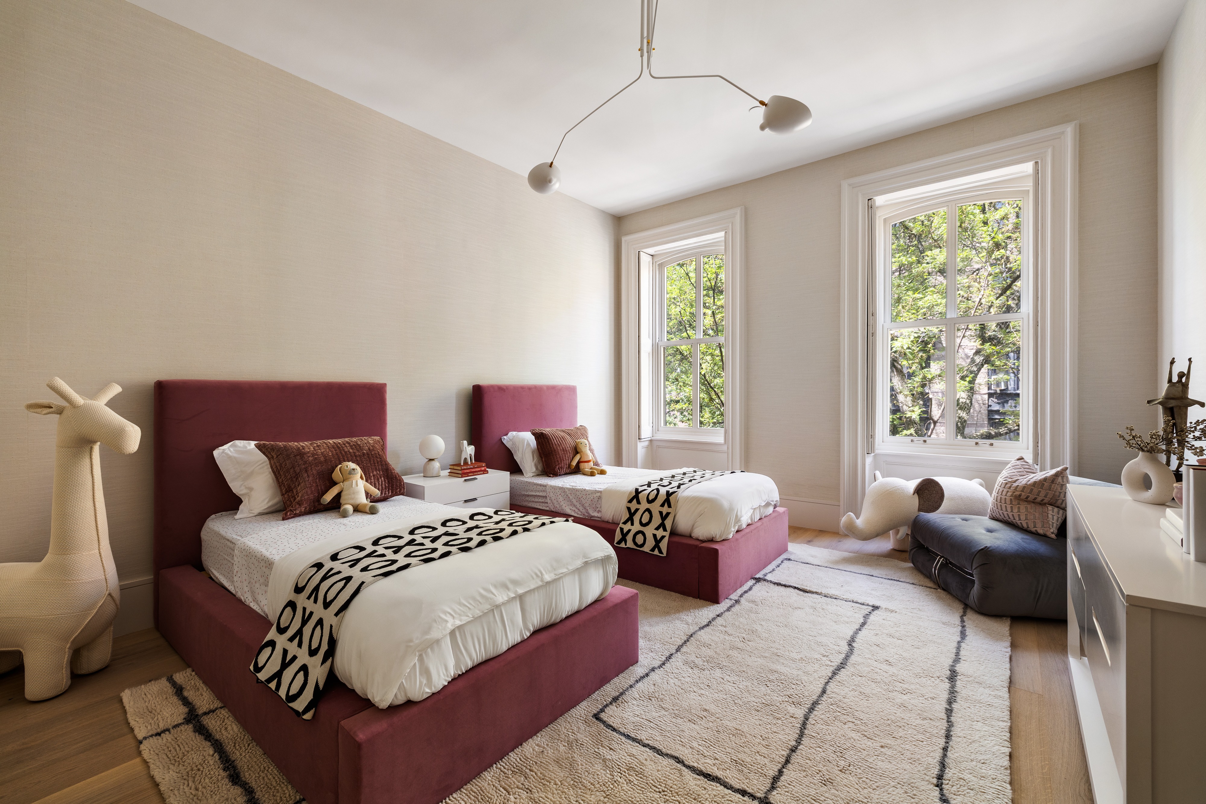 197 Clinton Street Brooklyn, NY 11201 - Photo 20 of 24 a bed room with two beds and a couch