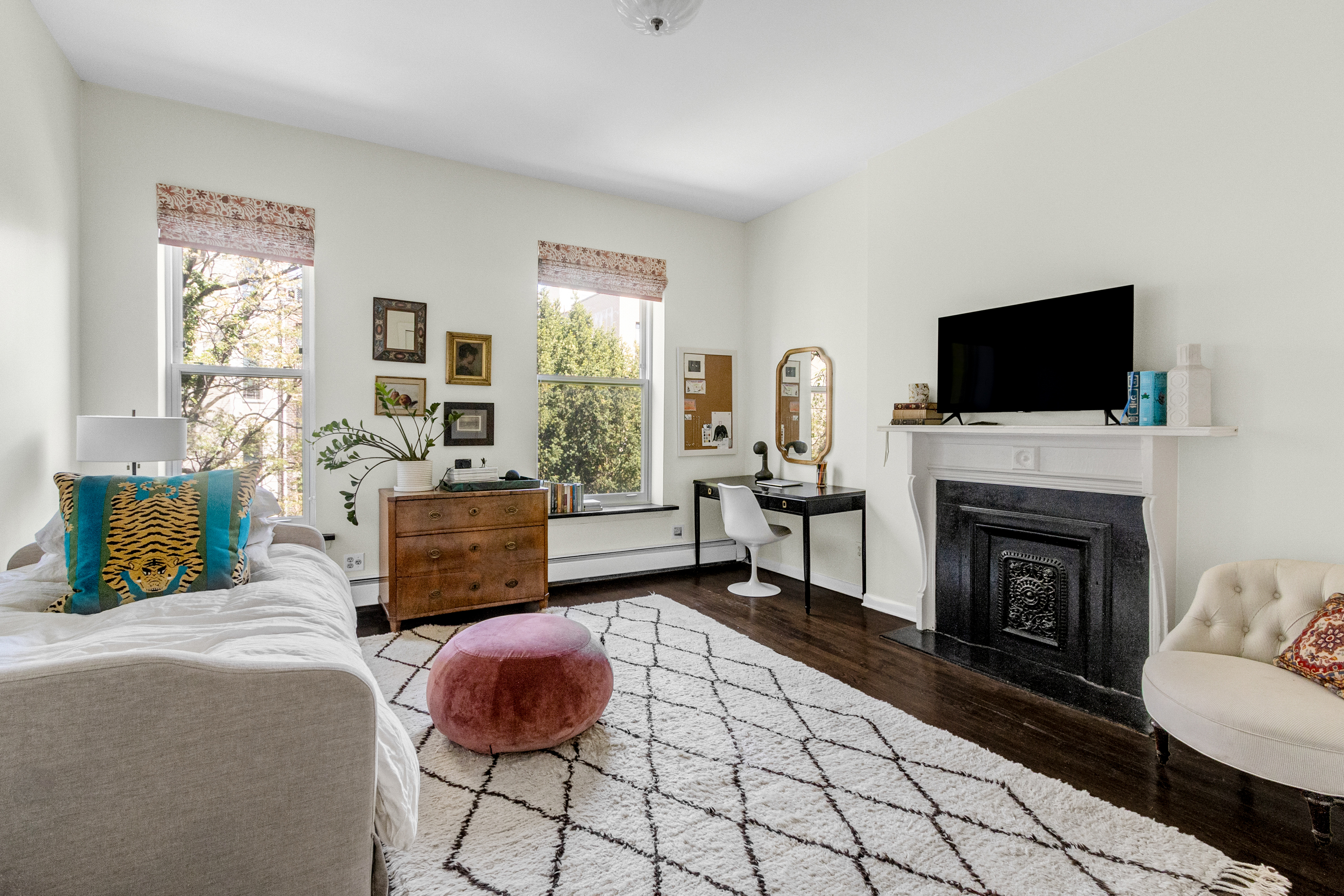 125 West 132nd Street Manhattan, NY 10027 - Photo 13 of 21 a living room with furniture and a fireplace
