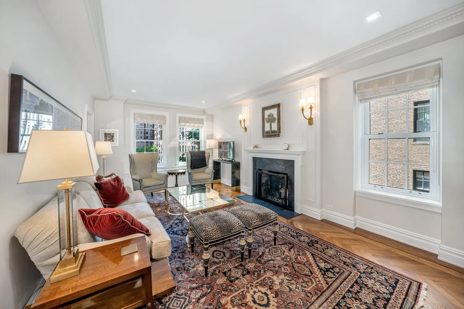 a living room with furniture rug and window