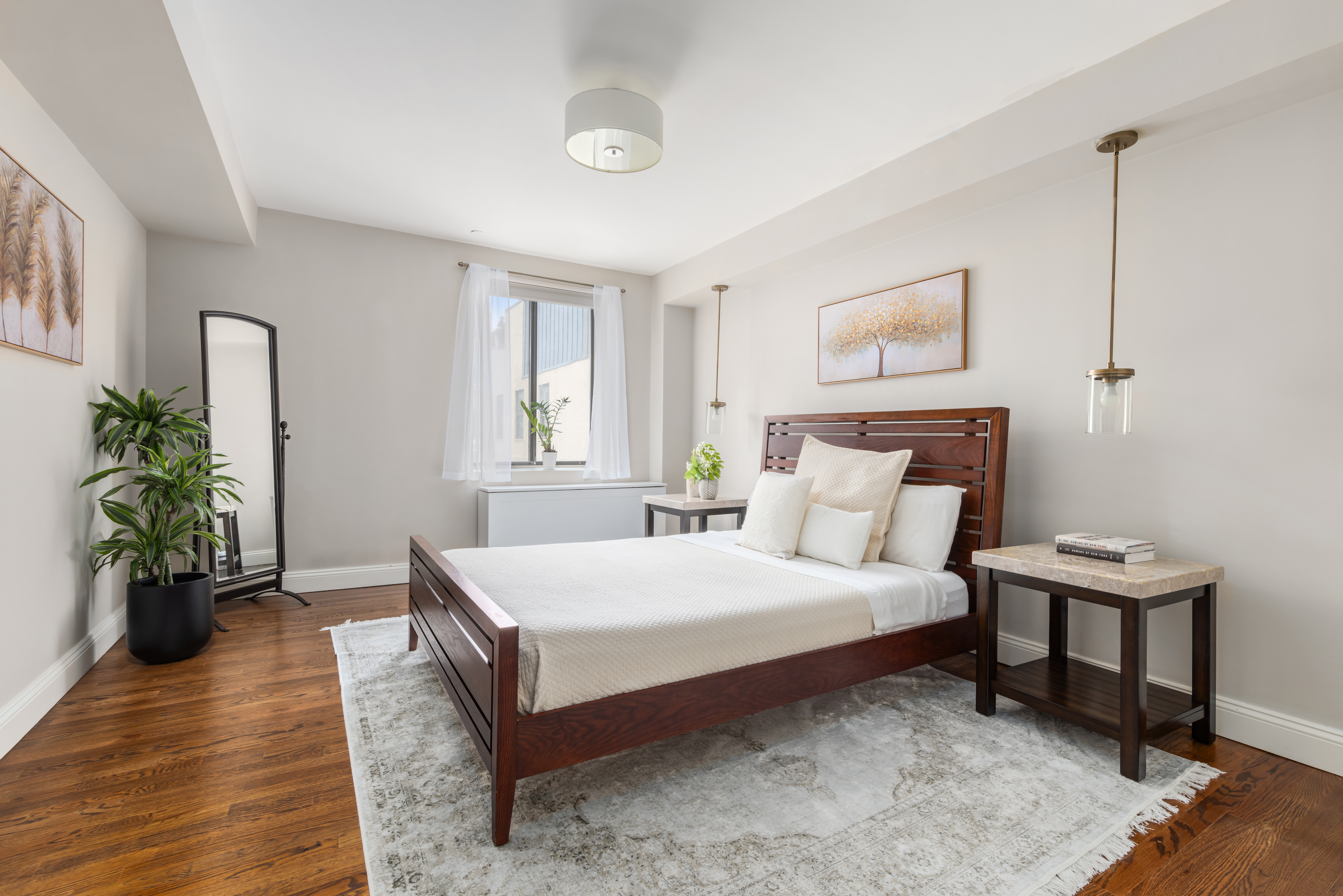 99 Reade Street, Unit 5E Manhattan, NY 10013 - Photo 7 of 13 a bedroom with a bed table and a couch