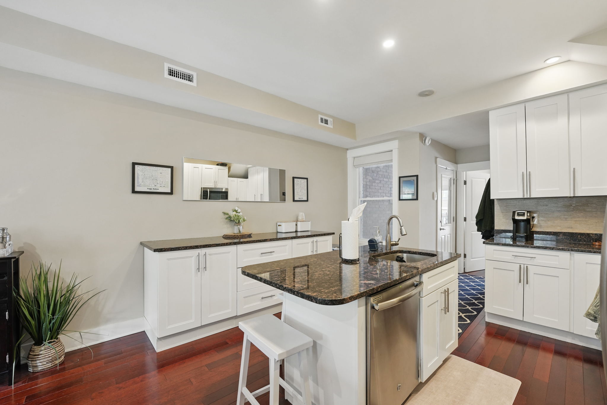28 Q Street Northeast, Unit 2 Washington, DC 20002 - Photo 11 of 41 a kitchen with stainless steel appliances granite countertop a sink stove and refrigerator