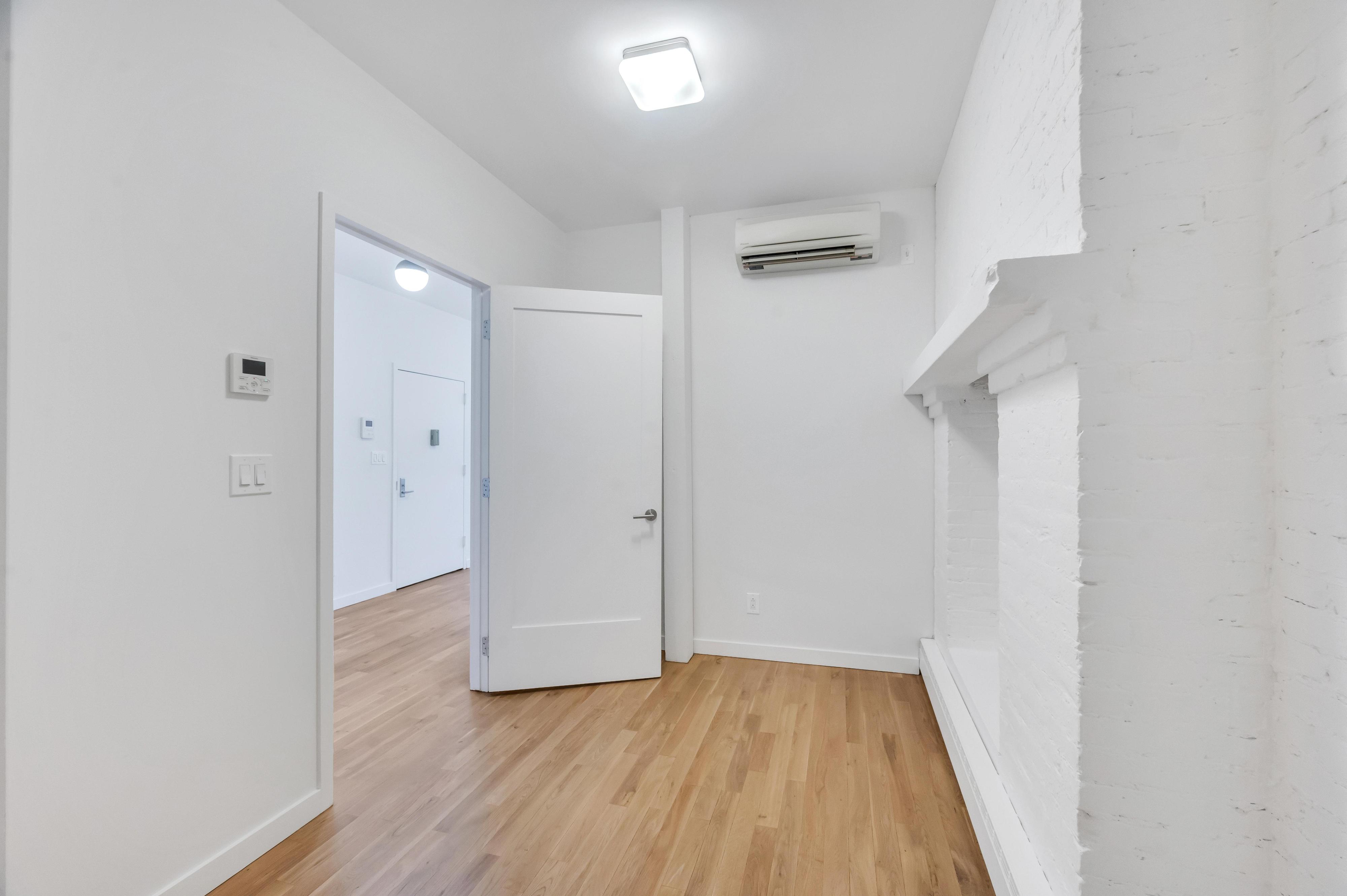 717 Manhattan Avenue, Unit 3A Brooklyn, NY 11222 - Photo 13 of 18 wooden floor in an empty room