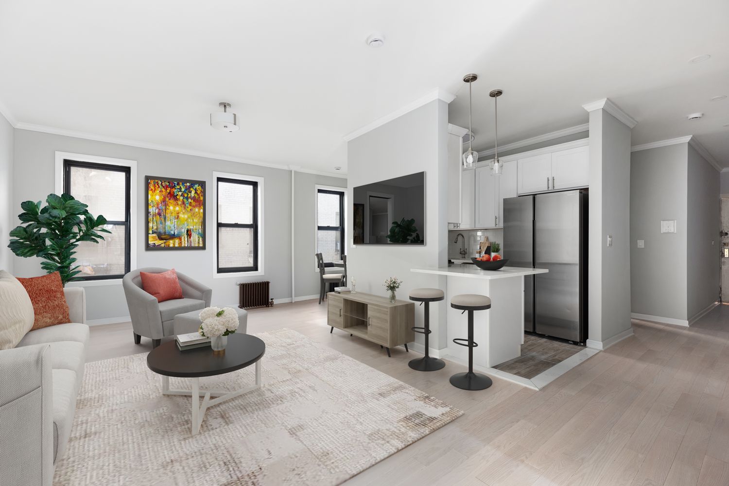 a living room with furniture and flat screen tv