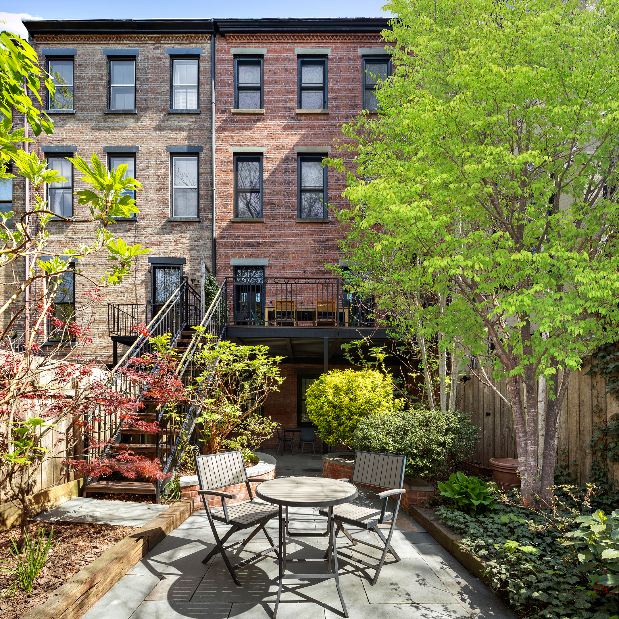 196 Berkeley Place Brooklyn, NY 11217 - Photo 10 of 25 a view of a chairs and table in a backyard