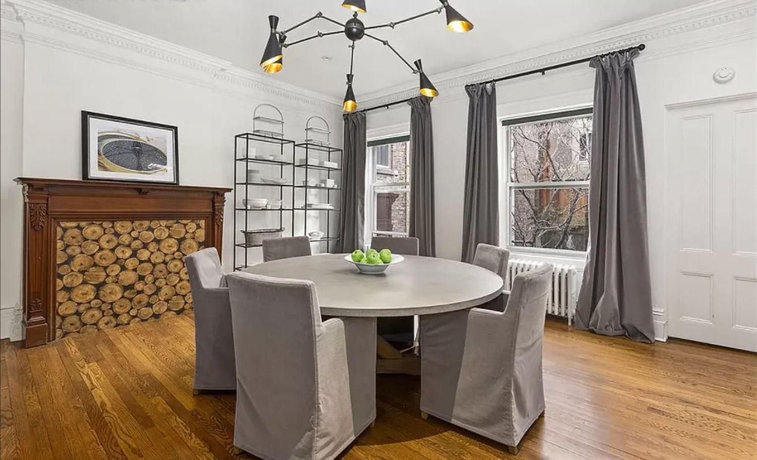 16 East 74th Street, Unit 4/5 Manhattan, NY 10021 - Photo 4 of 13 a view of a dining room with furniture window and wooden floor