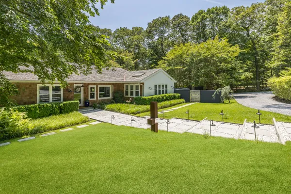 a view of a house with a big yard