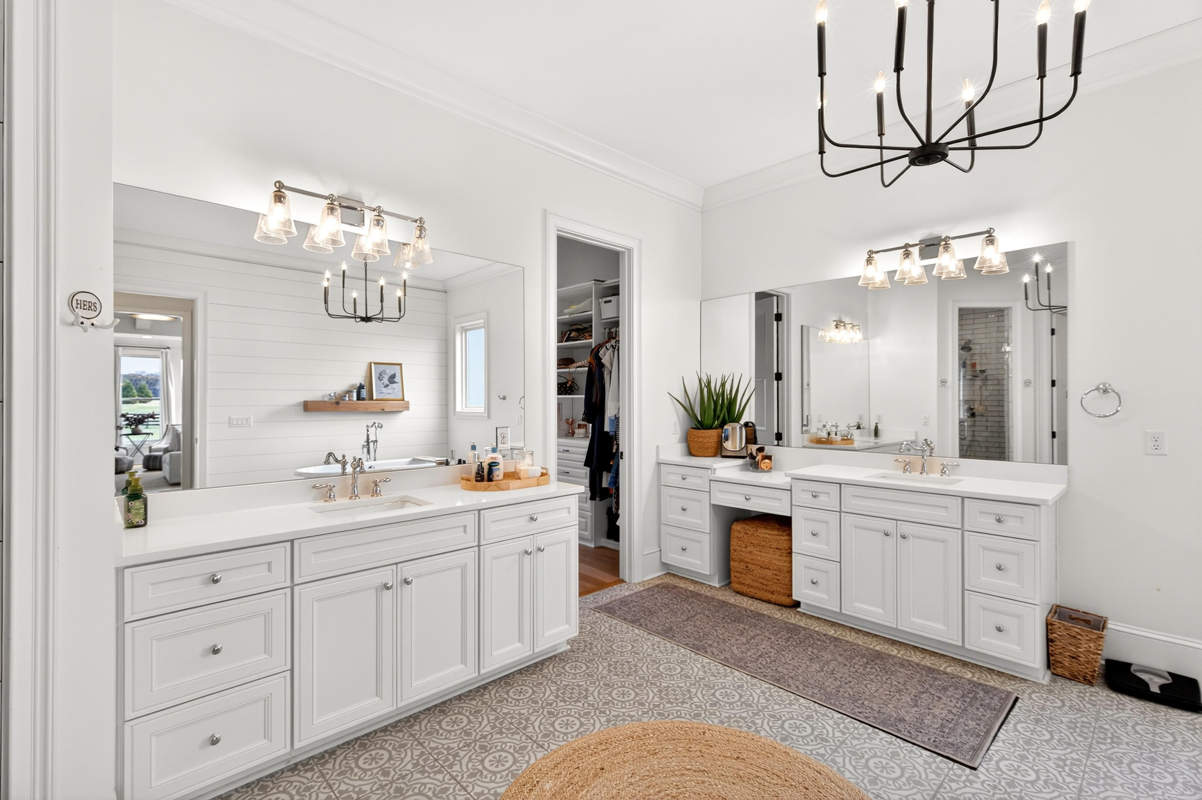 1703 Swansons Rdg Drive Franklin, TN 37064 - Photo 39 of 67 a spacious bathroom with a double vanity sink a mirror a bathtub and a window