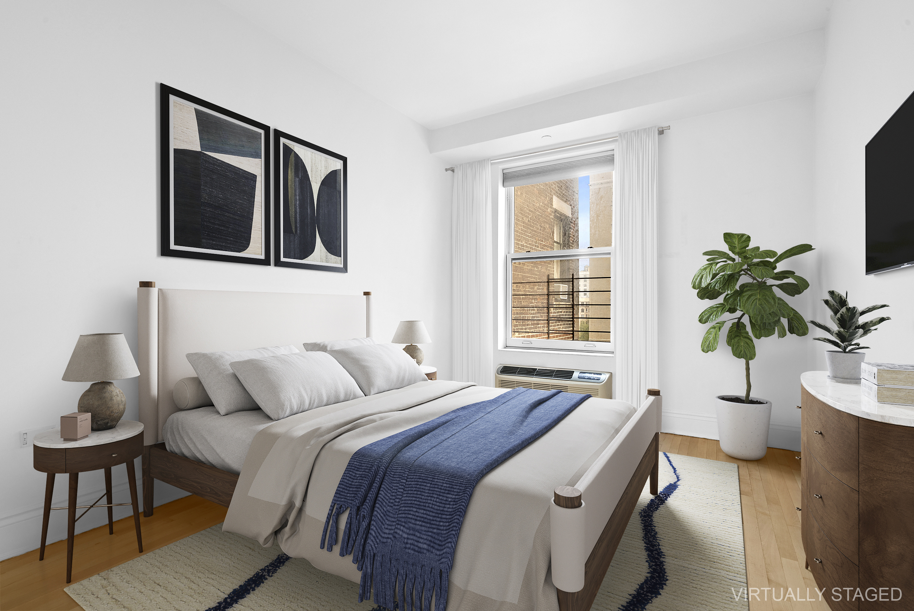 223 West 80th Street, Unit 7 Manhattan, NY 10024 - Photo 4 of 7 a bedroom with a bed and a potted plant