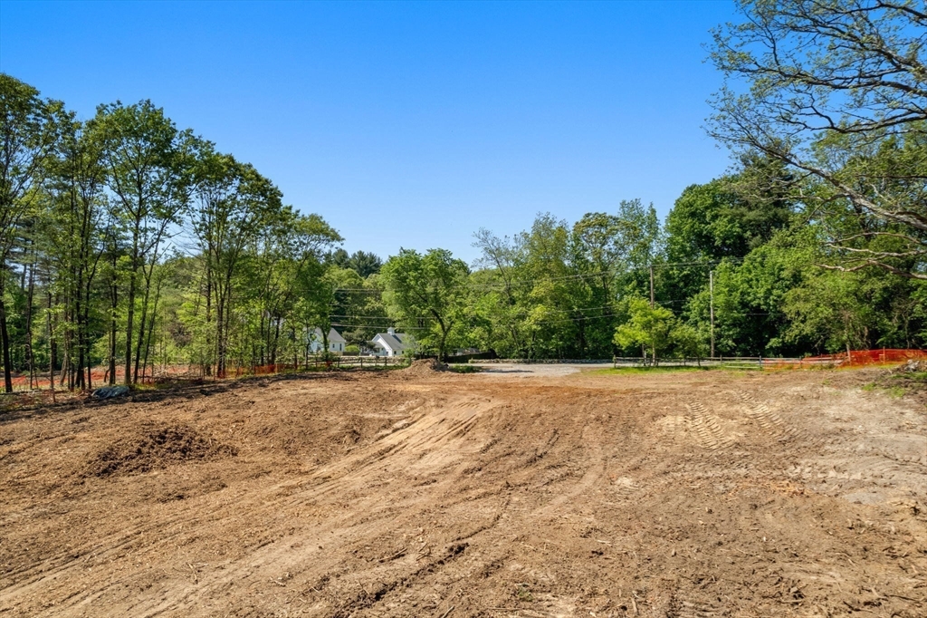 185 Dedham Street Dover, MA 02030 - Photo 14 of 32 a view of a yard with a house