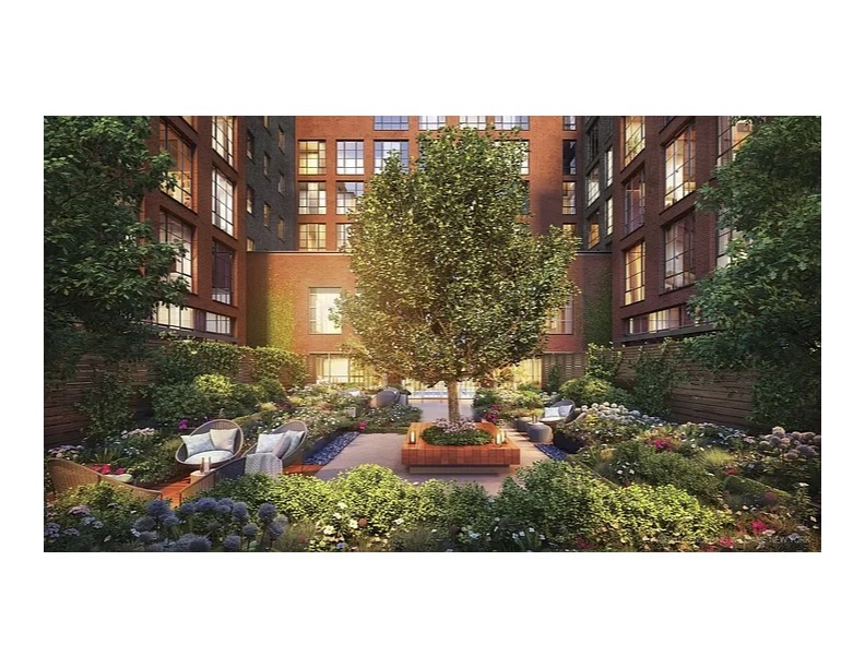 438 East 12th Street, Unit 6J Manhattan, NY 10009 - Photo 8 of 14 a view of a city with tall buildings