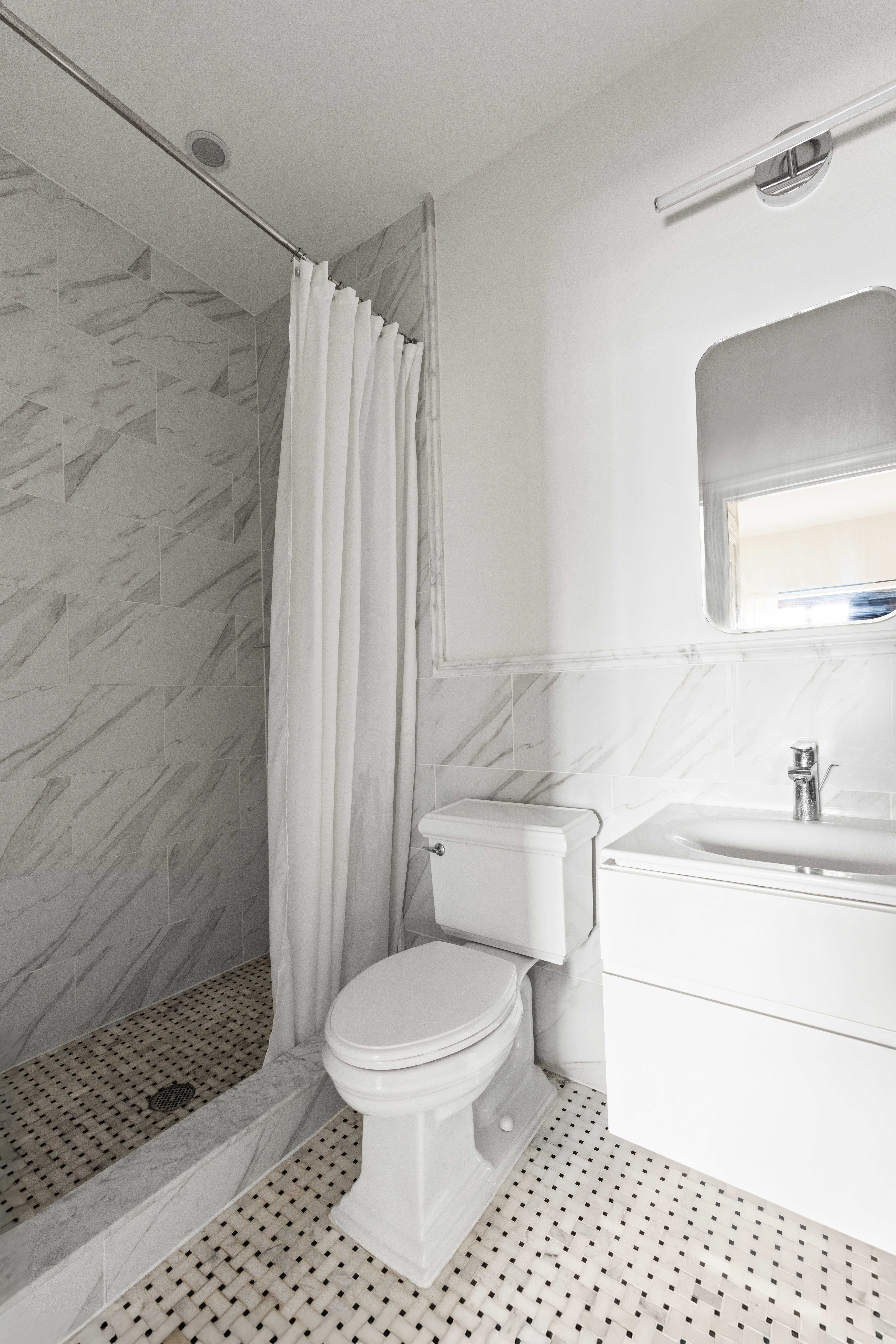 118 President Street, Unit 4 Brooklyn, NY 11231 - Photo 6 of 16 a bathroom with a sink a toilet and shower
