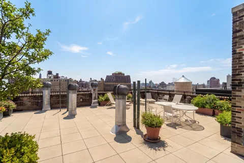 a view of a terrace with chairs