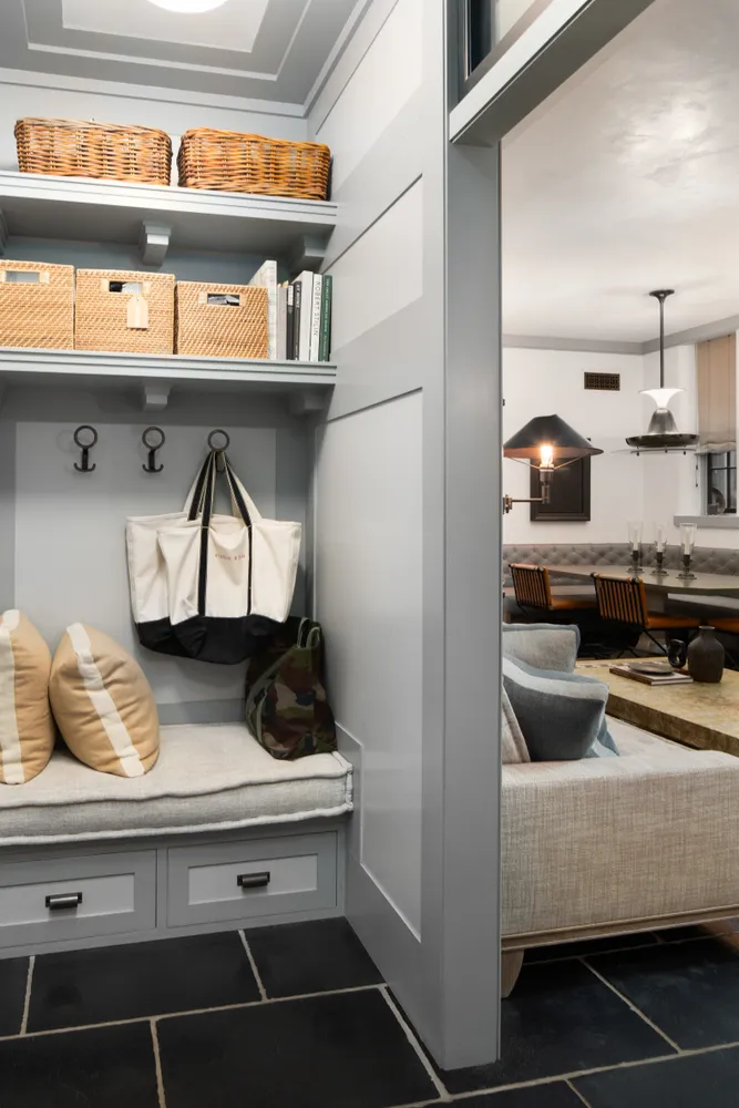a kitchen with a refrigerator and cabinets
