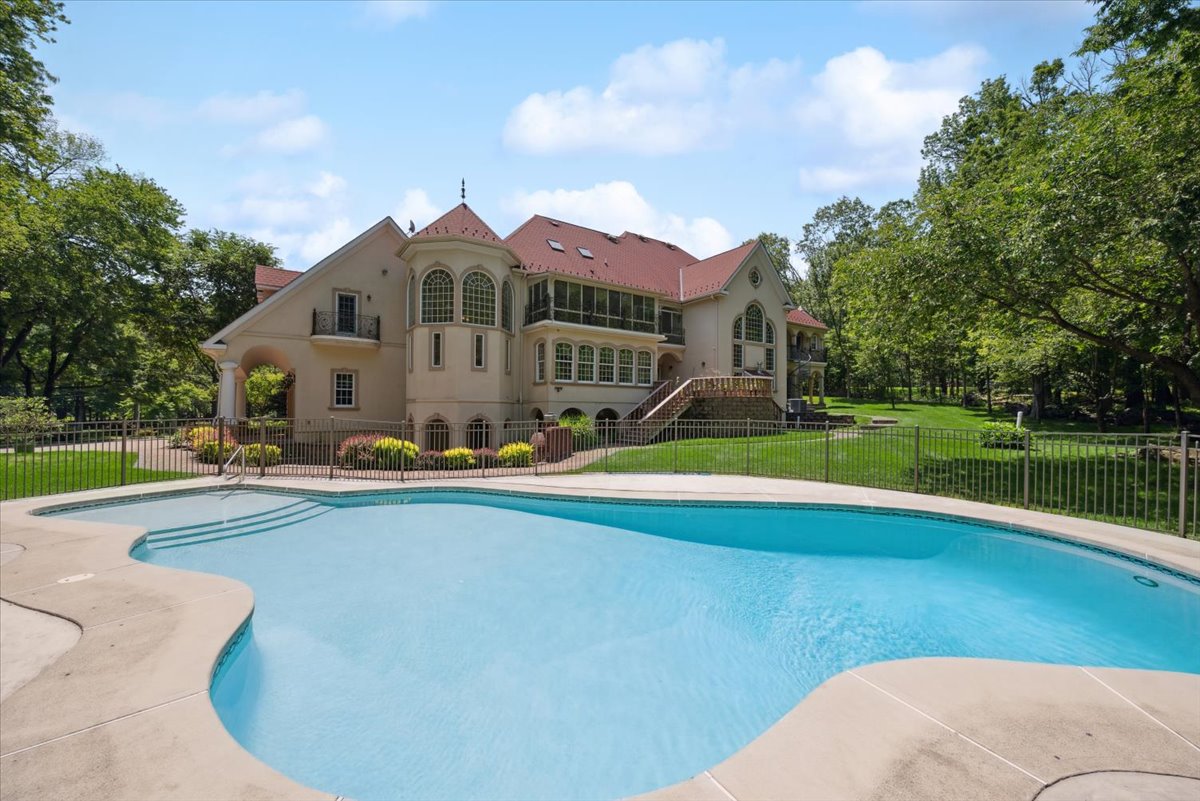 115 Skyline Drive Watchung, NJ 07069 - Photo 82 of 95 a front view of a house with swimming pool and yard