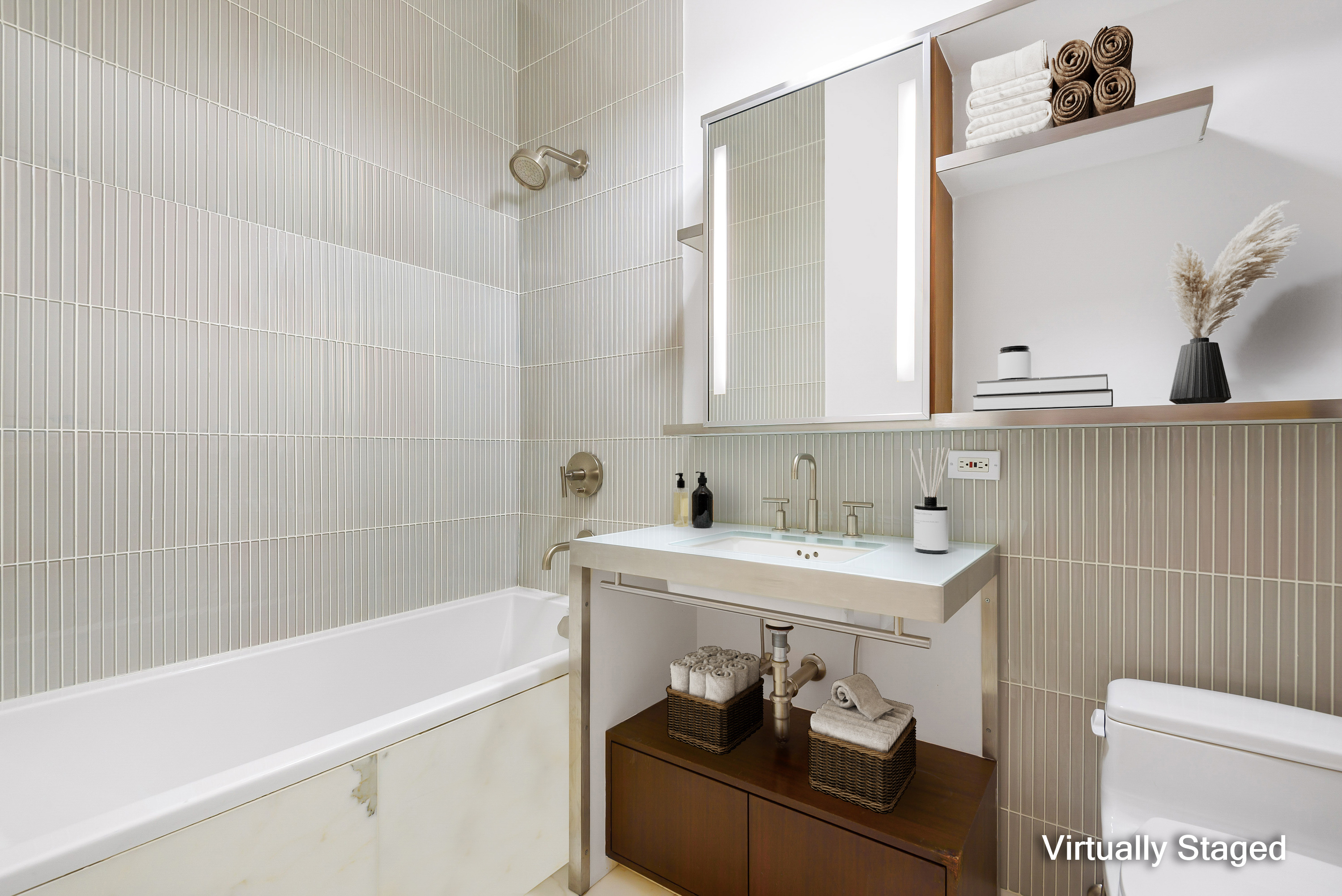 40 Mercer Street, Unit 19 Manhattan, NY 10013 - Photo 9 of 16 a bathroom with a sink and a mirror