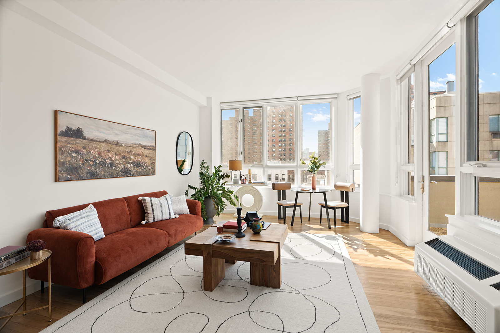 333 East 109th Street, Unit 7A Manhattan, NY 10029 - Photo 1 of 11 a living room with furniture and a large window