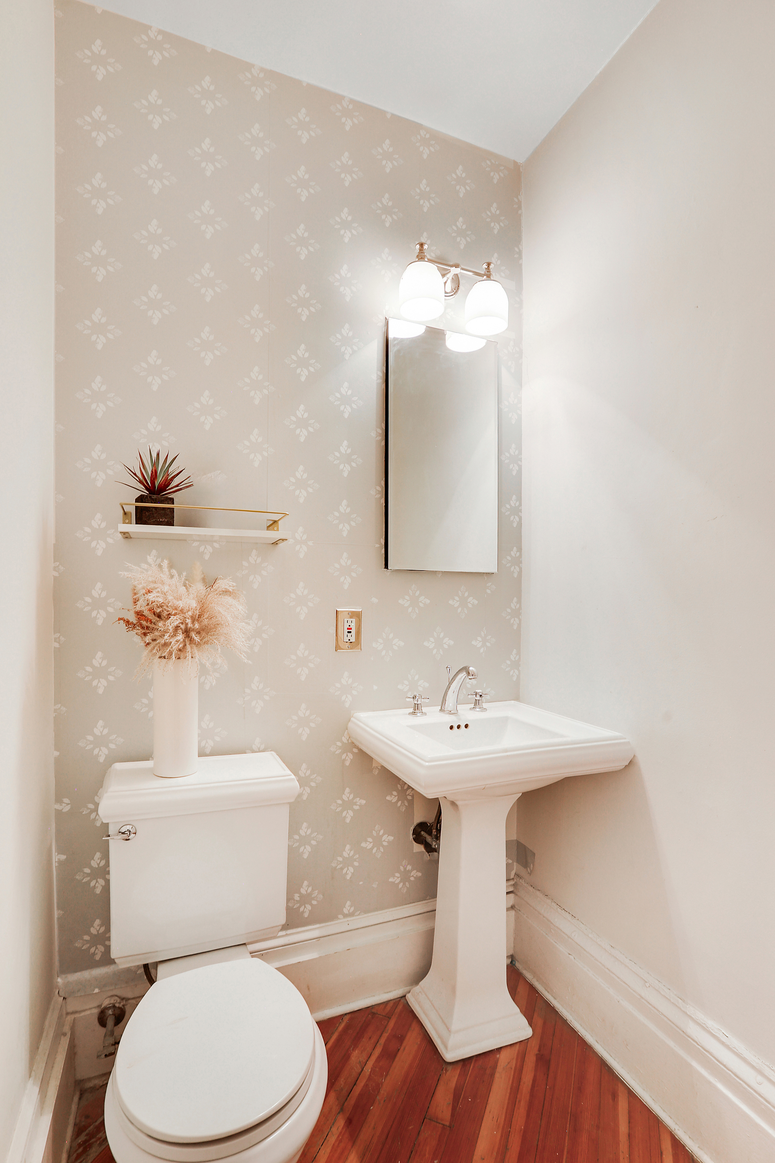 5 Great Jones Street Manhattan, NY 10012 - Photo 10 of 11 a bathroom with a sink mirror and toilet