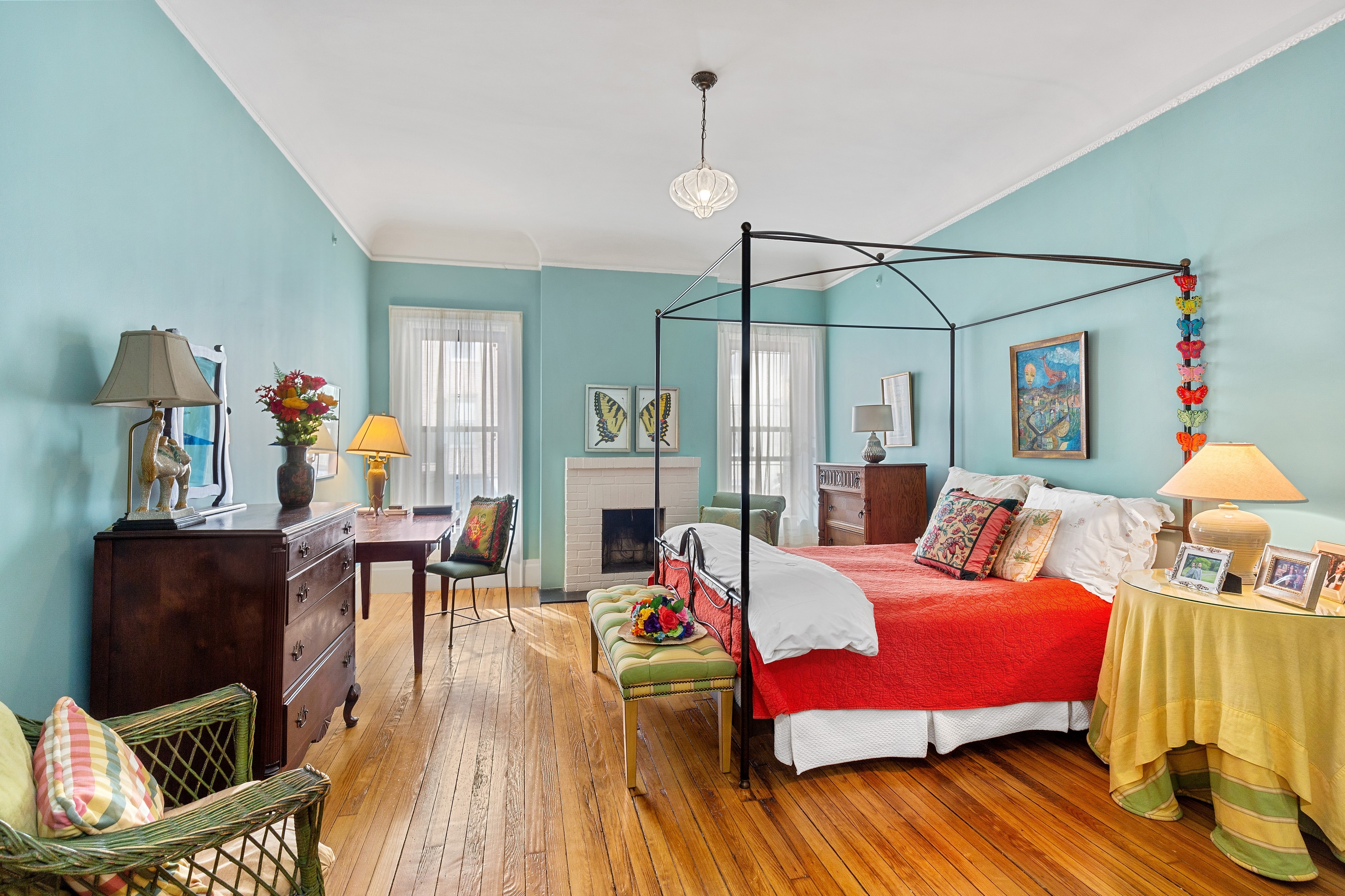 333 West 71st Street Manhattan, NY 10023 - Photo 18 of 29 a bedroom with furniture and a wooden floor