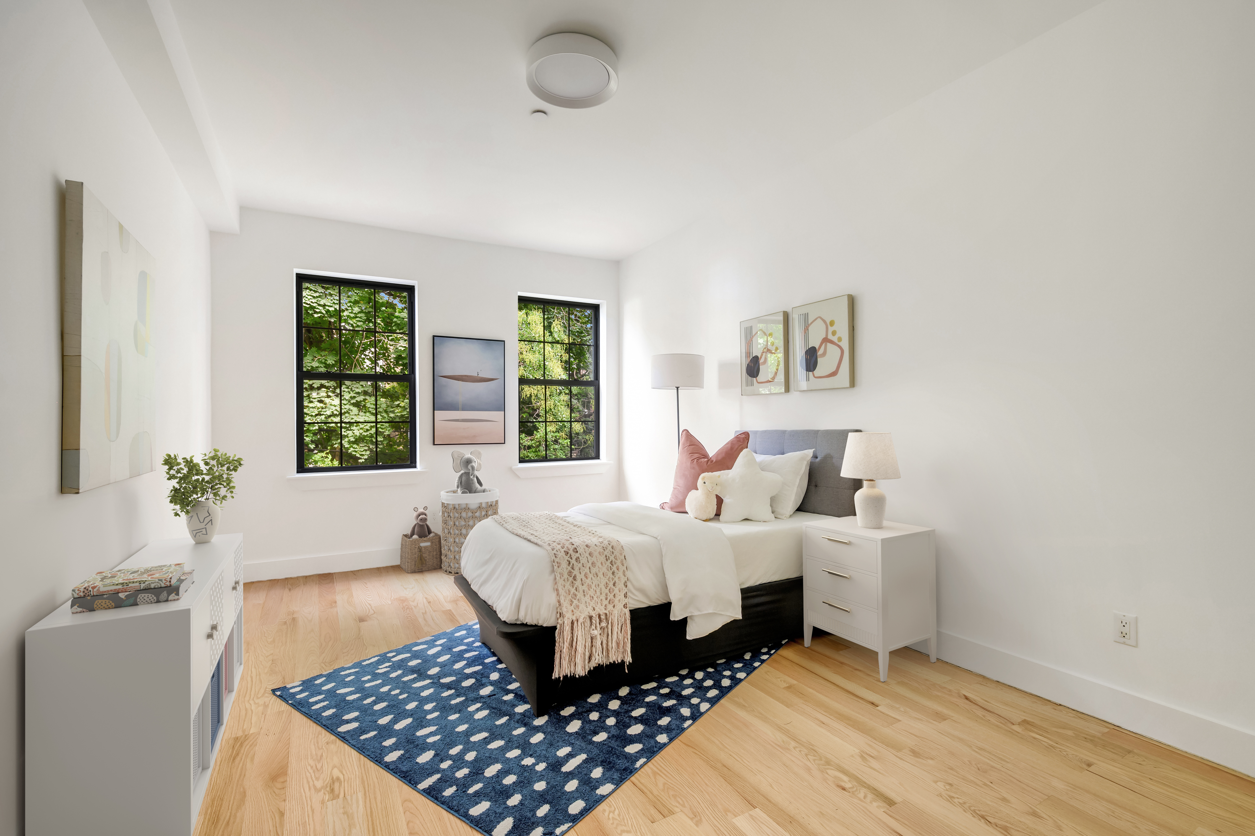 679 Quincy Street, Unit 2 Brooklyn, NY 11221 - Photo 5 of 9 a room with a bed and a window