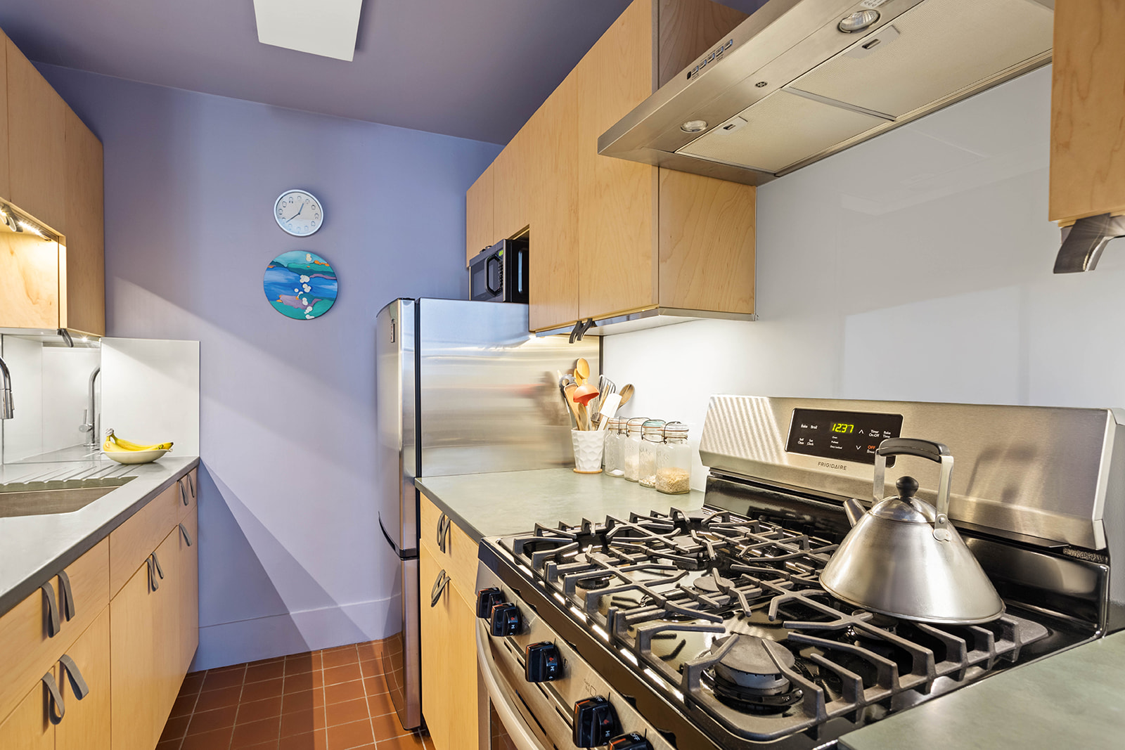 285 5th Avenue, Unit 2B Brooklyn, NY 11215 - Photo 3 of 6 a kitchen with a stove and a sink