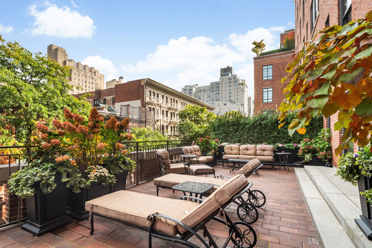 a view of a terrace with sitting area