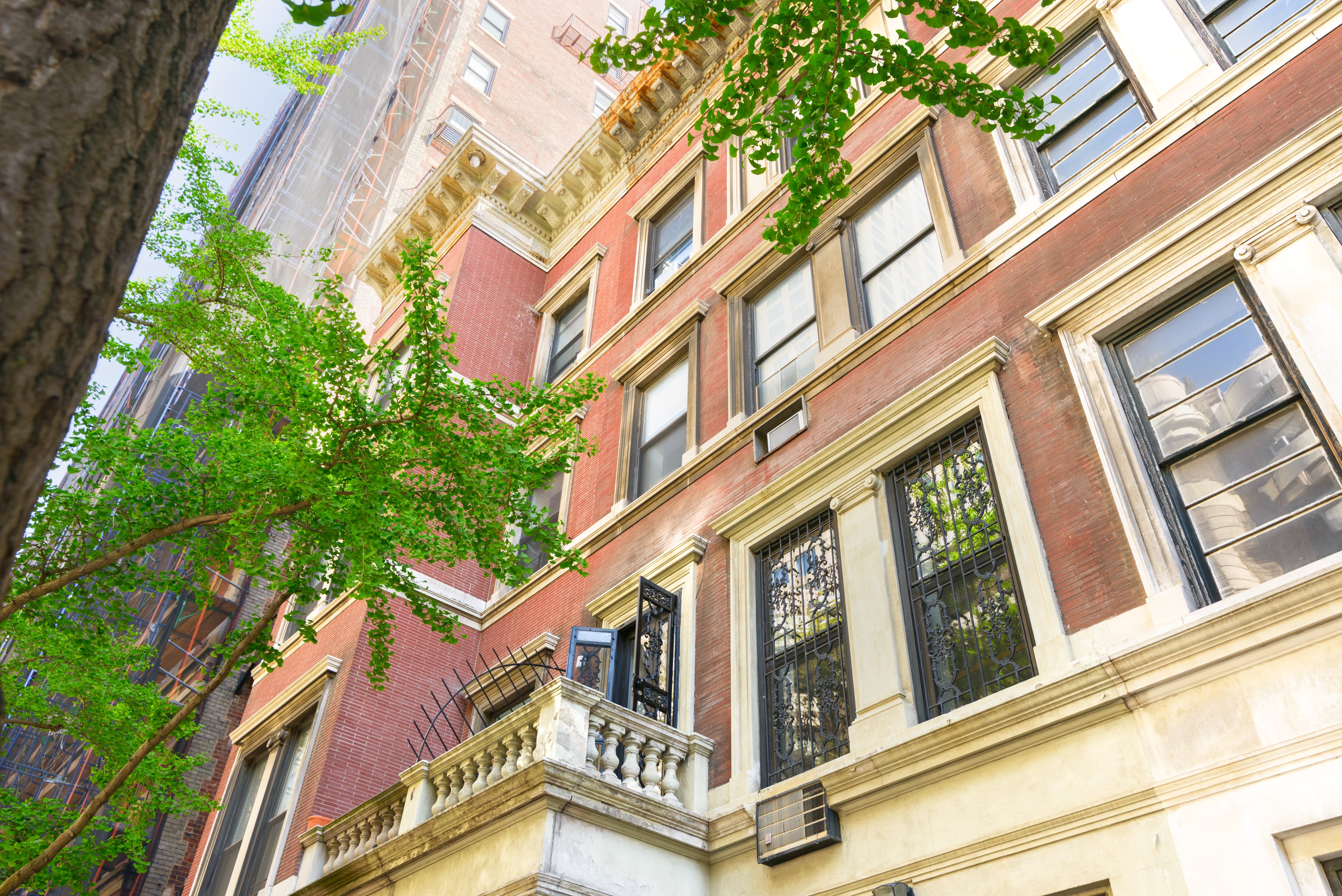 349 West 71st Street Manhattan, NY 10023 - Photo 20 of 21 a view of an buildings with a tree