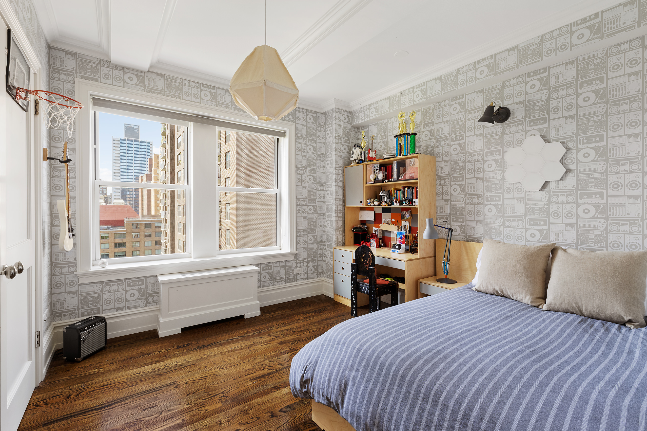 165 West 91st Street, Unit 9AB Manhattan, NY 10024 - Photo 13 of 24 a bedroom with a bed and a large window