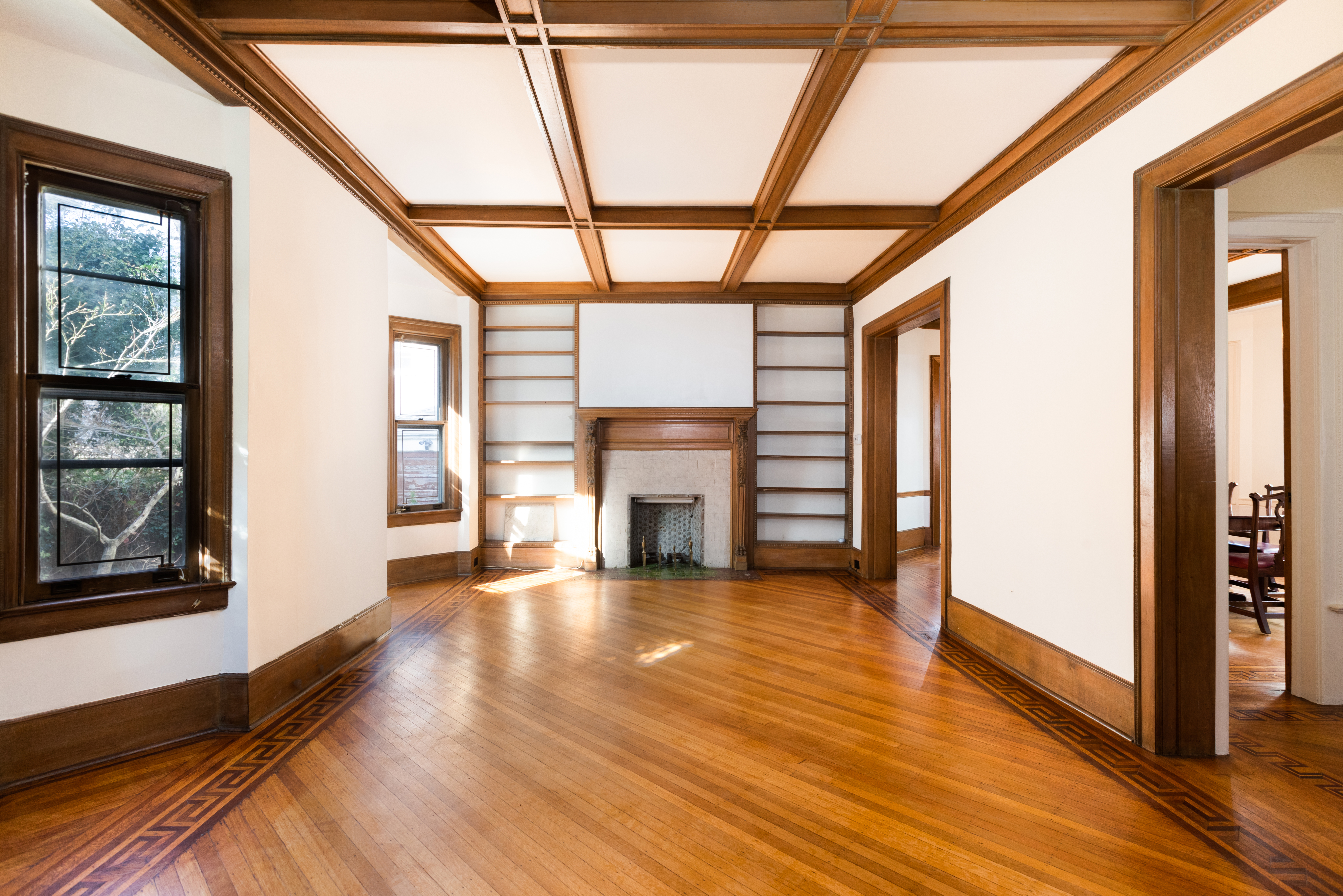 196 Marlborough Road Brooklyn, NY 11226 - Photo 5 of 23 a view of an empty room with wooden floor and a window