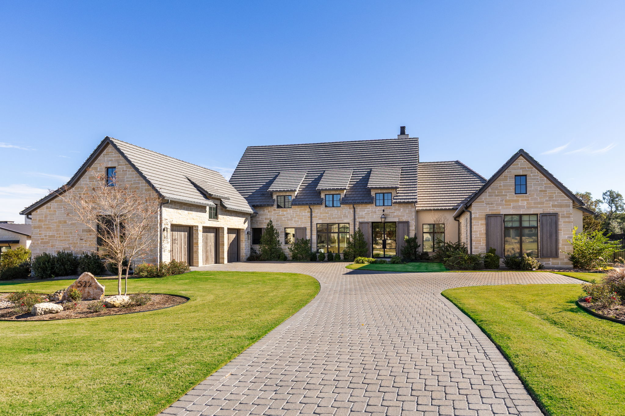 a view of house with yard and green space