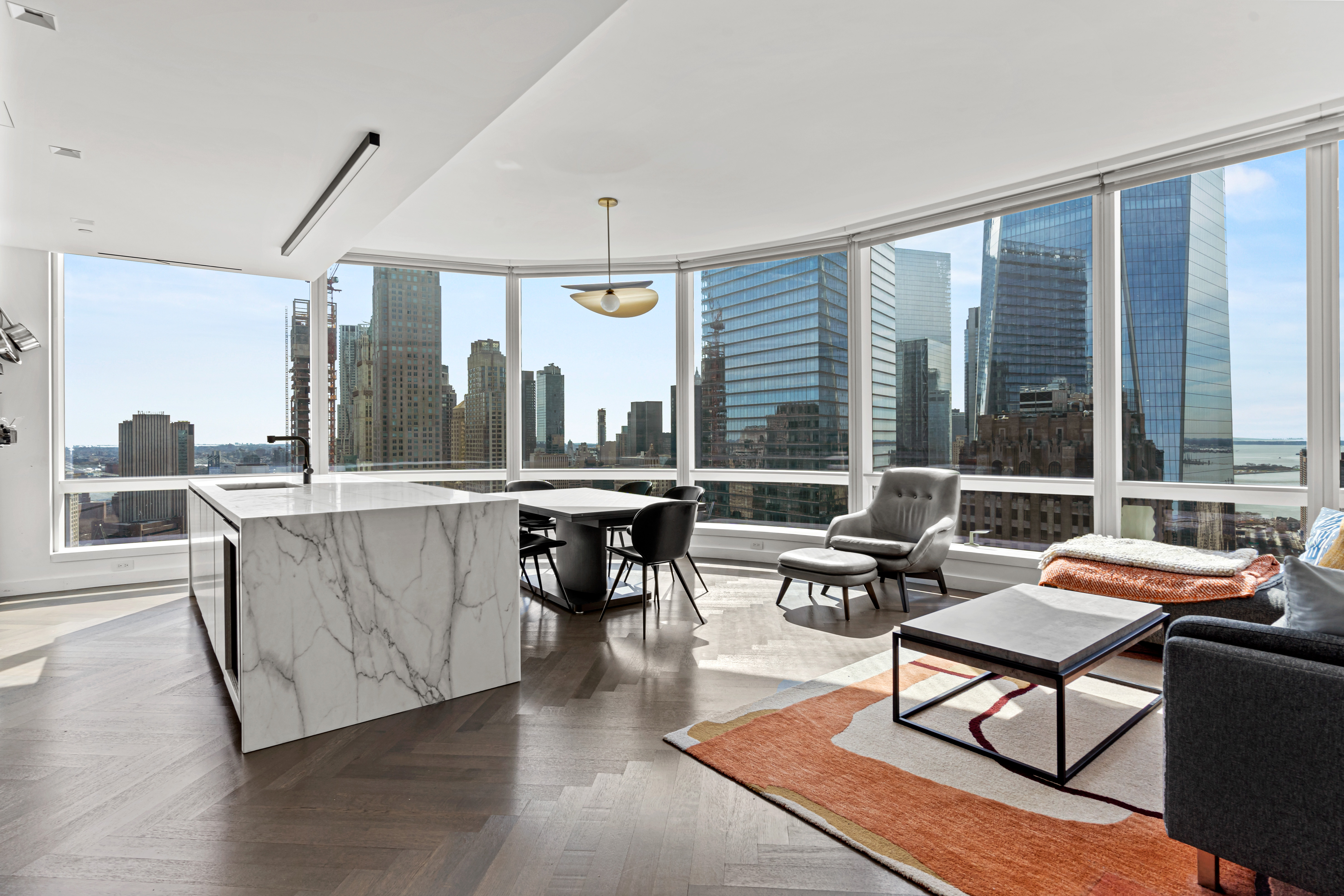 111 Murray Street, Unit 43B Manhattan, NY 10007 - Photo 1 of 17 a living room with furniture a large window and wooden floor