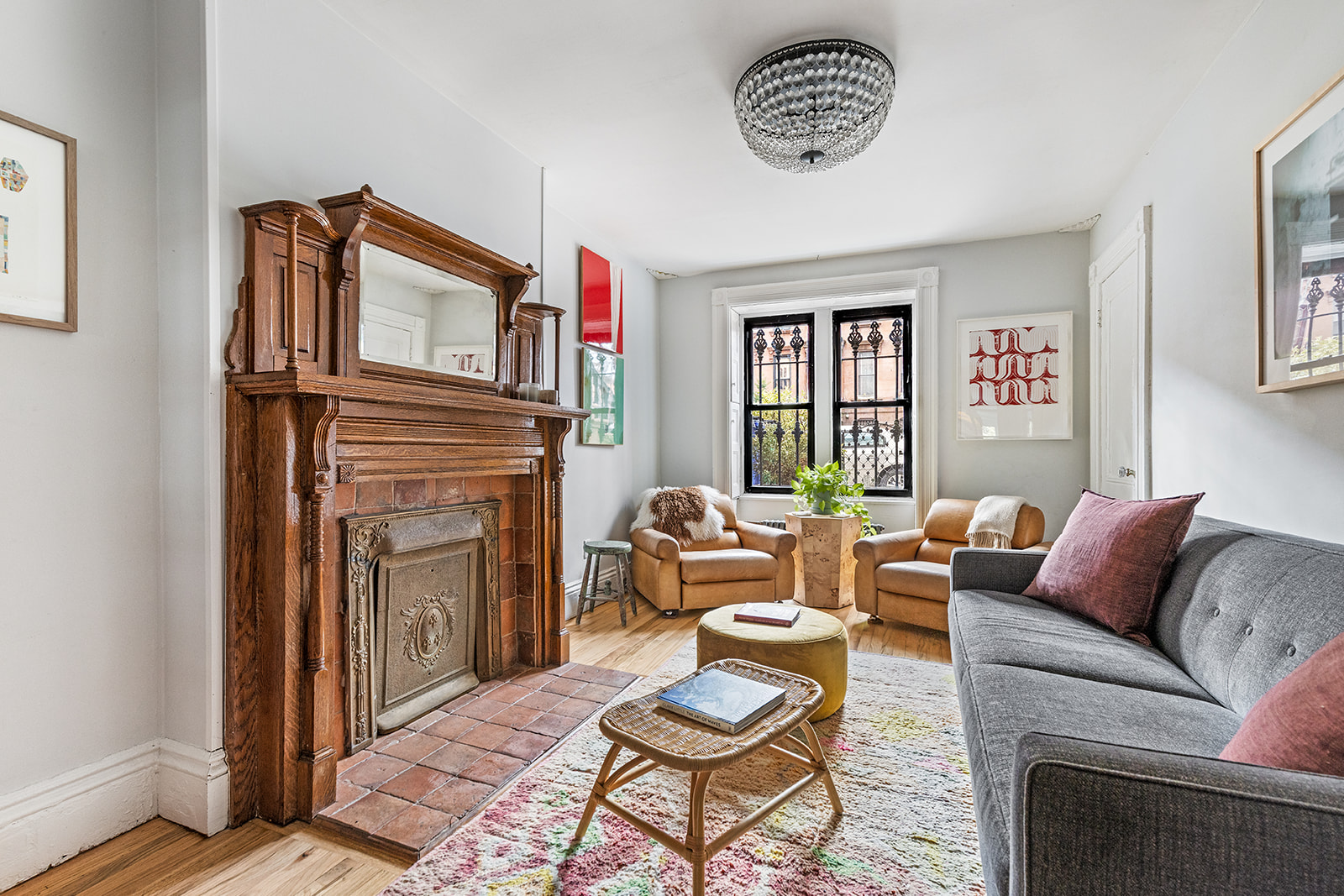 331 A Stuyvesant Avenue Brooklyn, NY 11233 - Photo 13 of 21 a living room with furniture a window and a fireplace