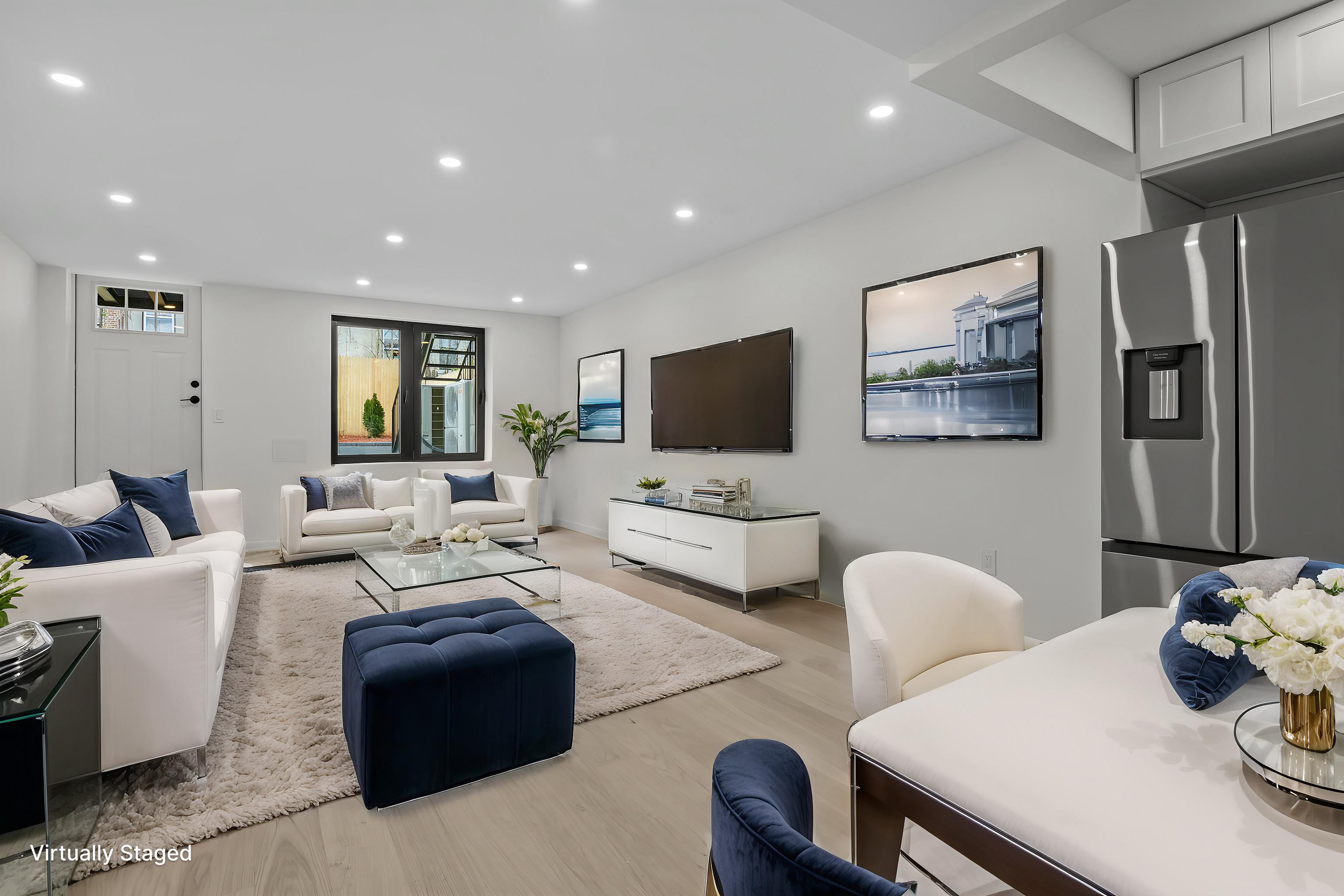 320 10th Street Brooklyn, NY 11215 - Photo 18 of 27 a living room with furniture and a flat screen tv