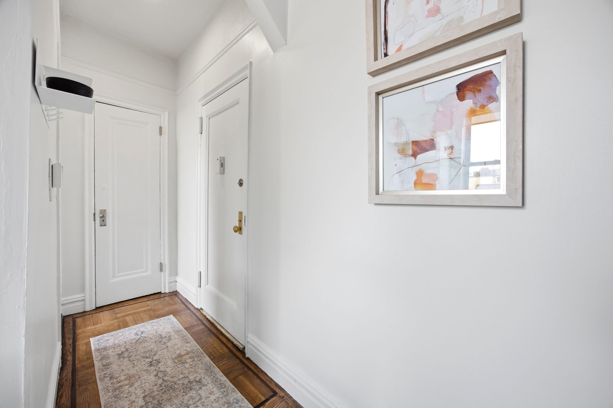 485 Central Park West, Unit 7A Manhattan, NY 10025 - Photo 11 of 15 a view of hallway with wooden floor