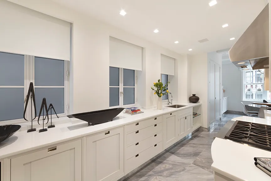 a spacious bathroom with double sink and a large mirror