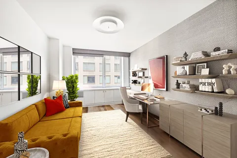 a living room with furniture window and wooden floor