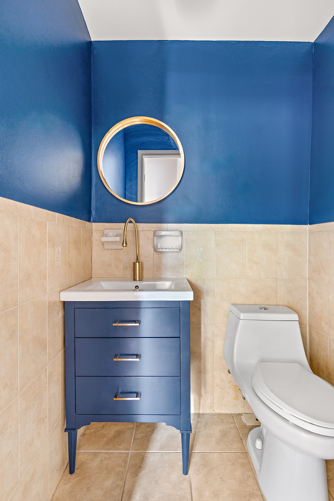 383 Bainbridge Street, Unit 1 Brooklyn, NY 11233 - Photo 10 of 14 a bathroom with a toilet mirror vanity and vanity