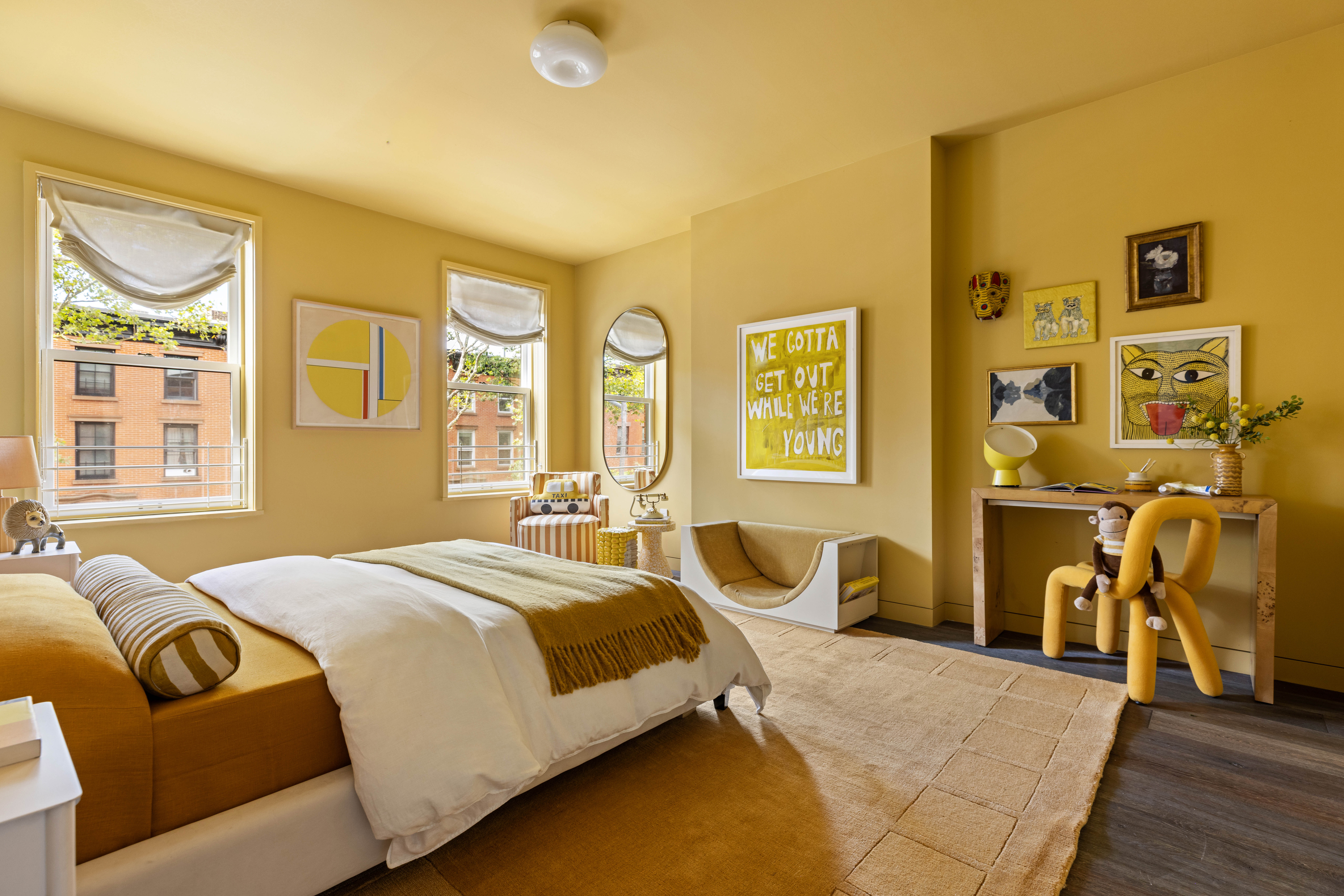 229 Dean Street Brooklyn, NY 11217 - Photo 17 of 23 a bedroom with a bed and wooden floor