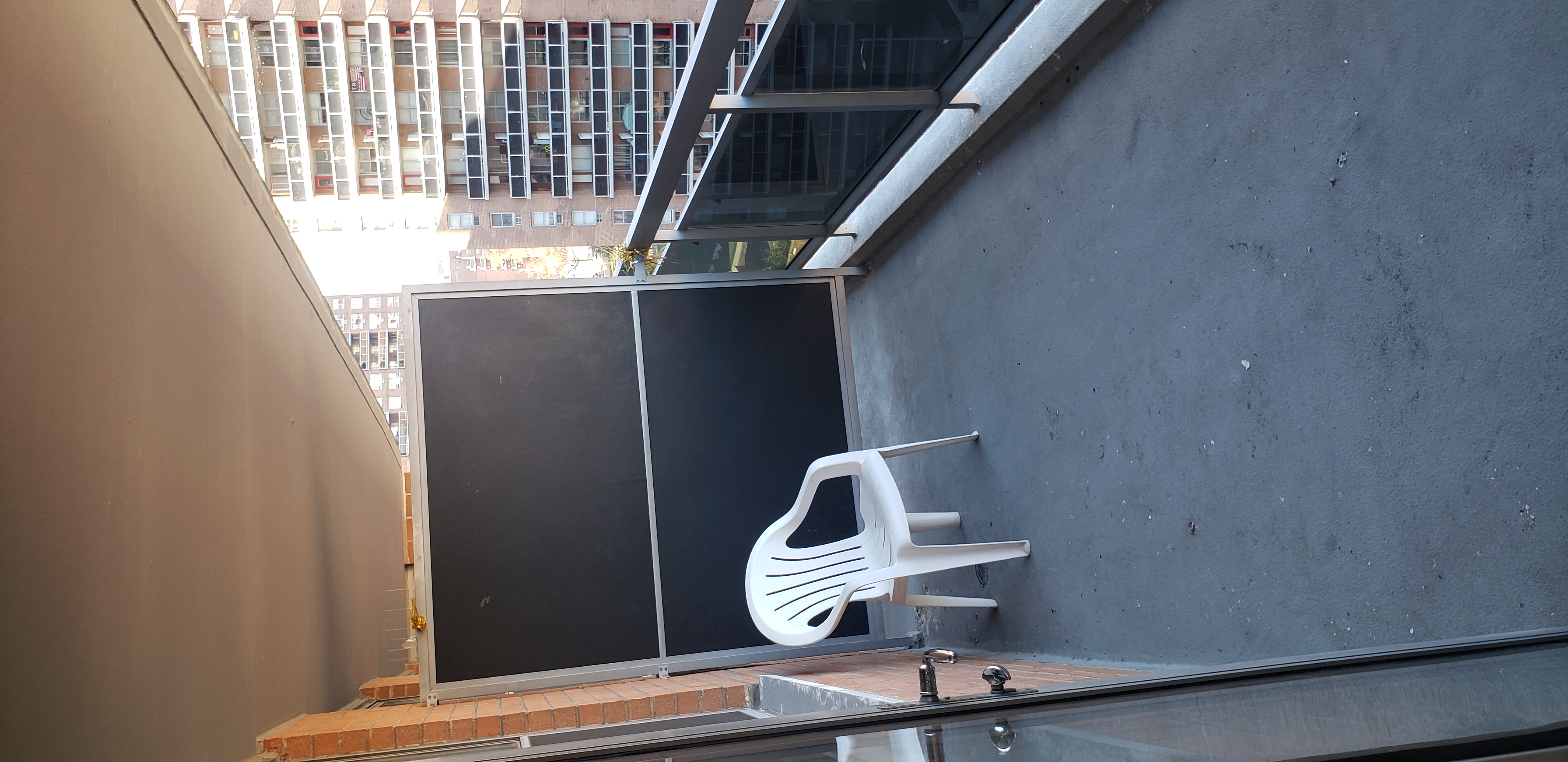 70-25 Yellowstone Boulevard, Unit 11D Queens, NY 11375 - Photo 13 of 25 a view of an empty room with a window