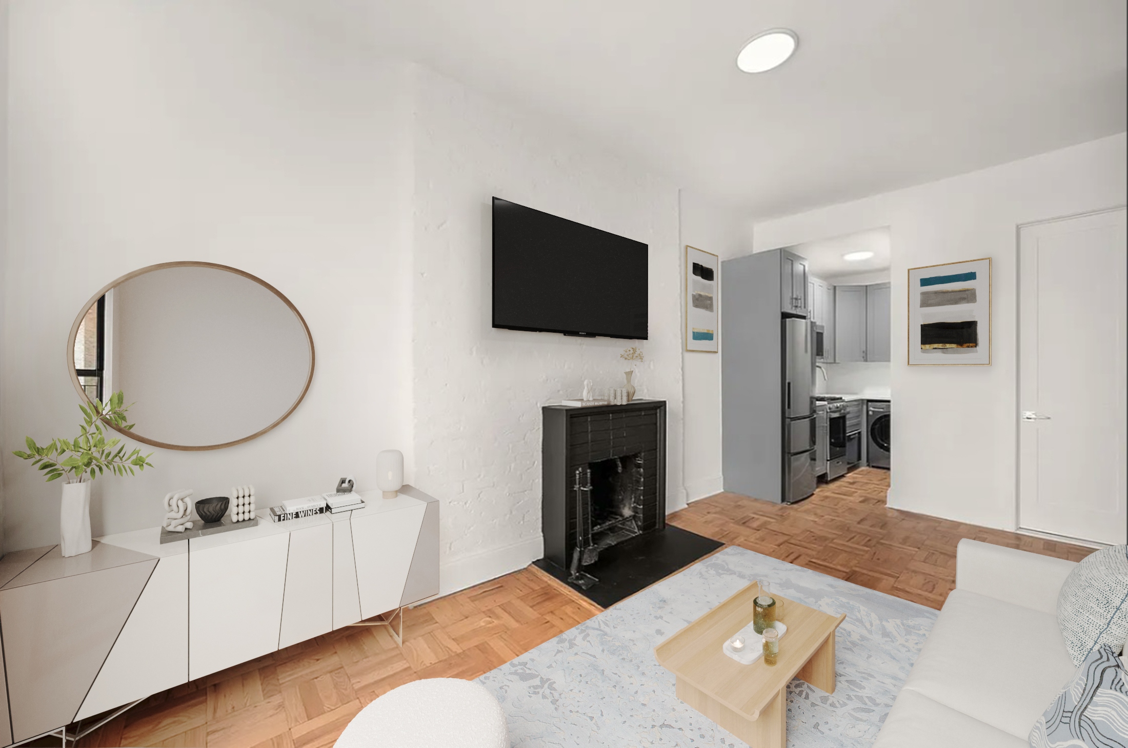 130 West 80th Street, Unit 5R Manhattan, NY 10024 - Photo 2 of 7 a living room with furniture a fireplace and a flat screen tv