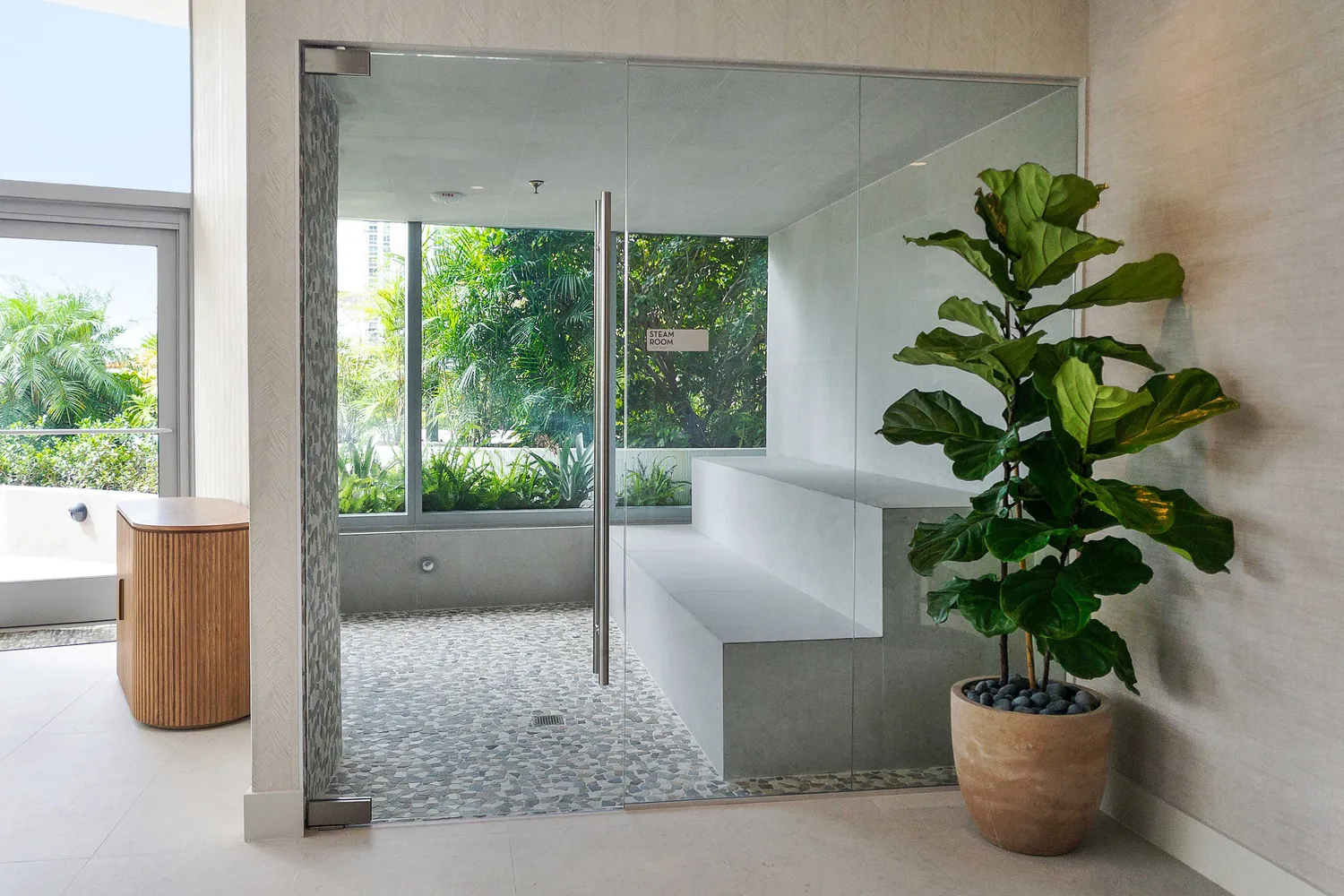 a swimming pool with outdoor seating and yard