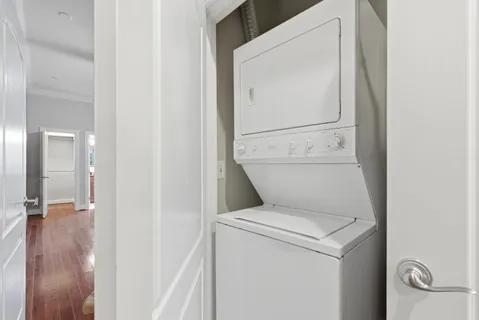 a bathroom with a toilet and a mirror