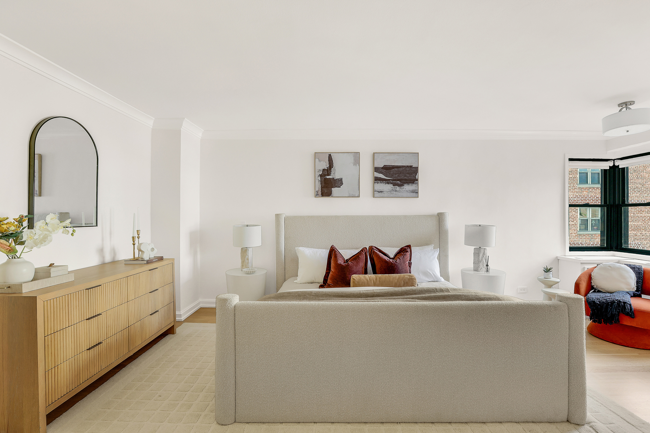 31 Jane Street, Unit 10FG Manhattan, NY 10014 - Photo 13 of 27 a living room with furniture and window